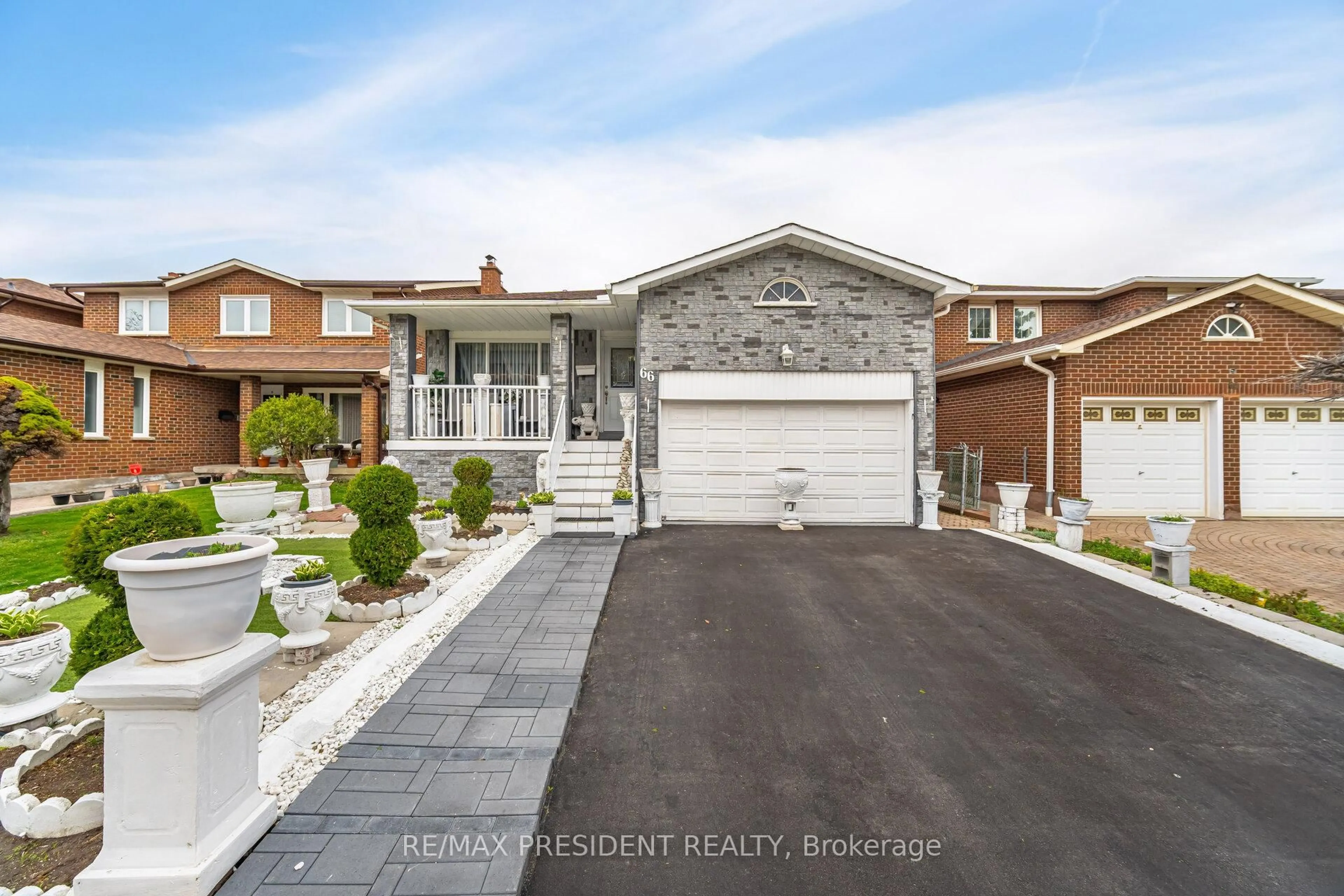 Home with brick exterior material, street for 66 Gihon Spring Dr, Toronto Ontario M9V 4X9