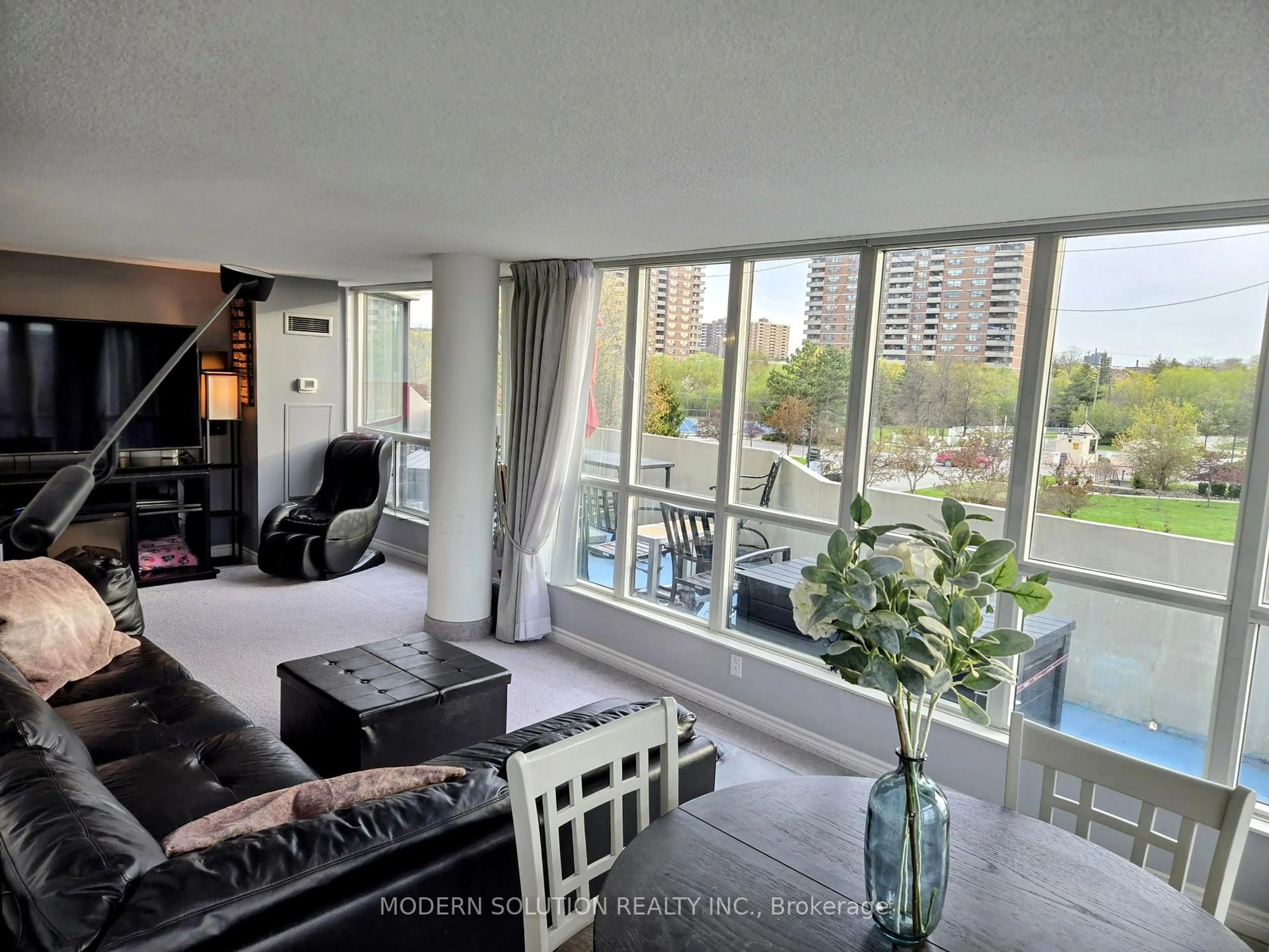 Living room with furniture, unknown for 3 Rowntree Rd #312, Toronto Ontario M9V 5G8