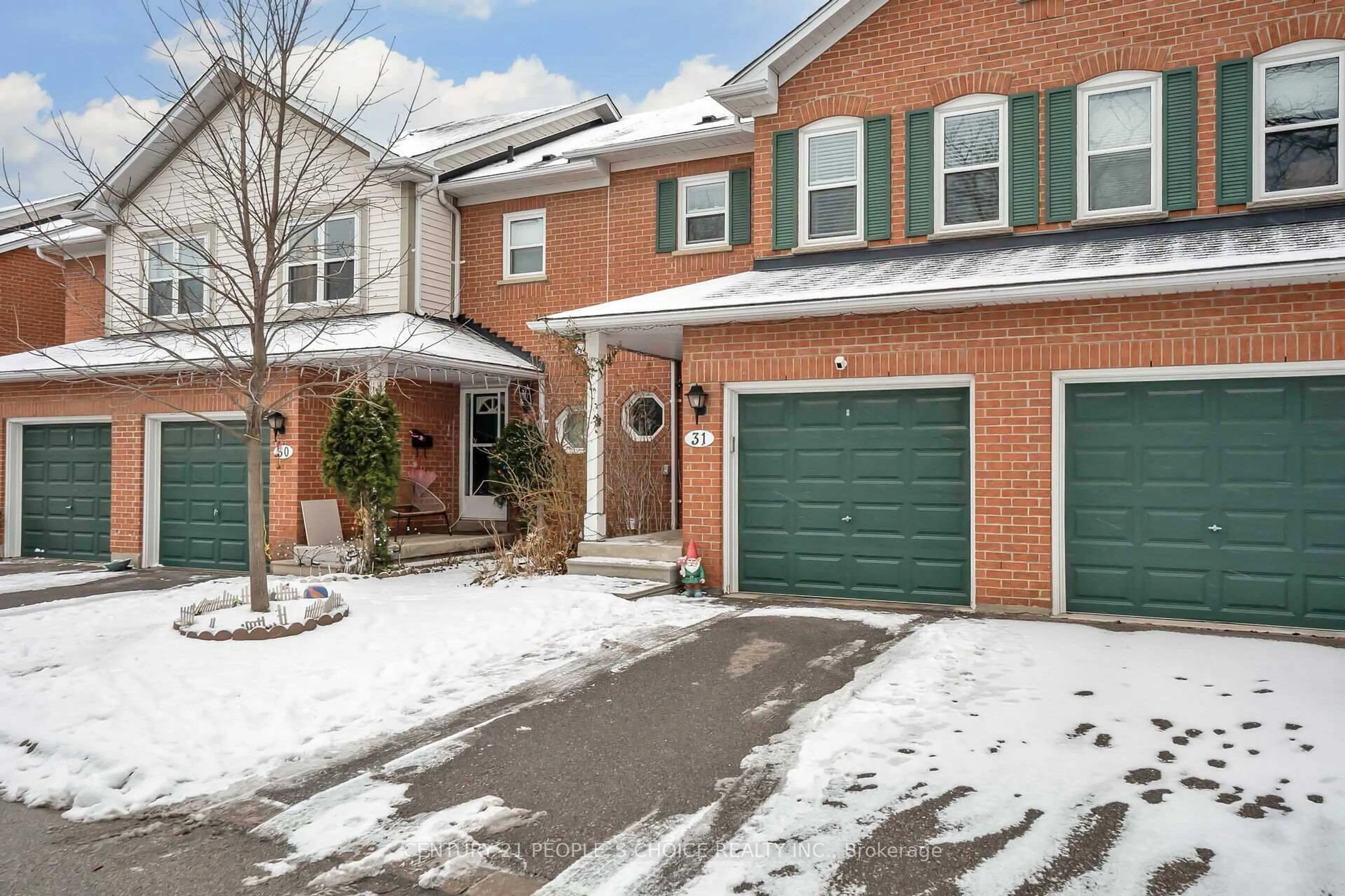 Home with brick exterior material, street for 5659 Glen Erin Dr #31, Mississauga Ontario L5M 5P2