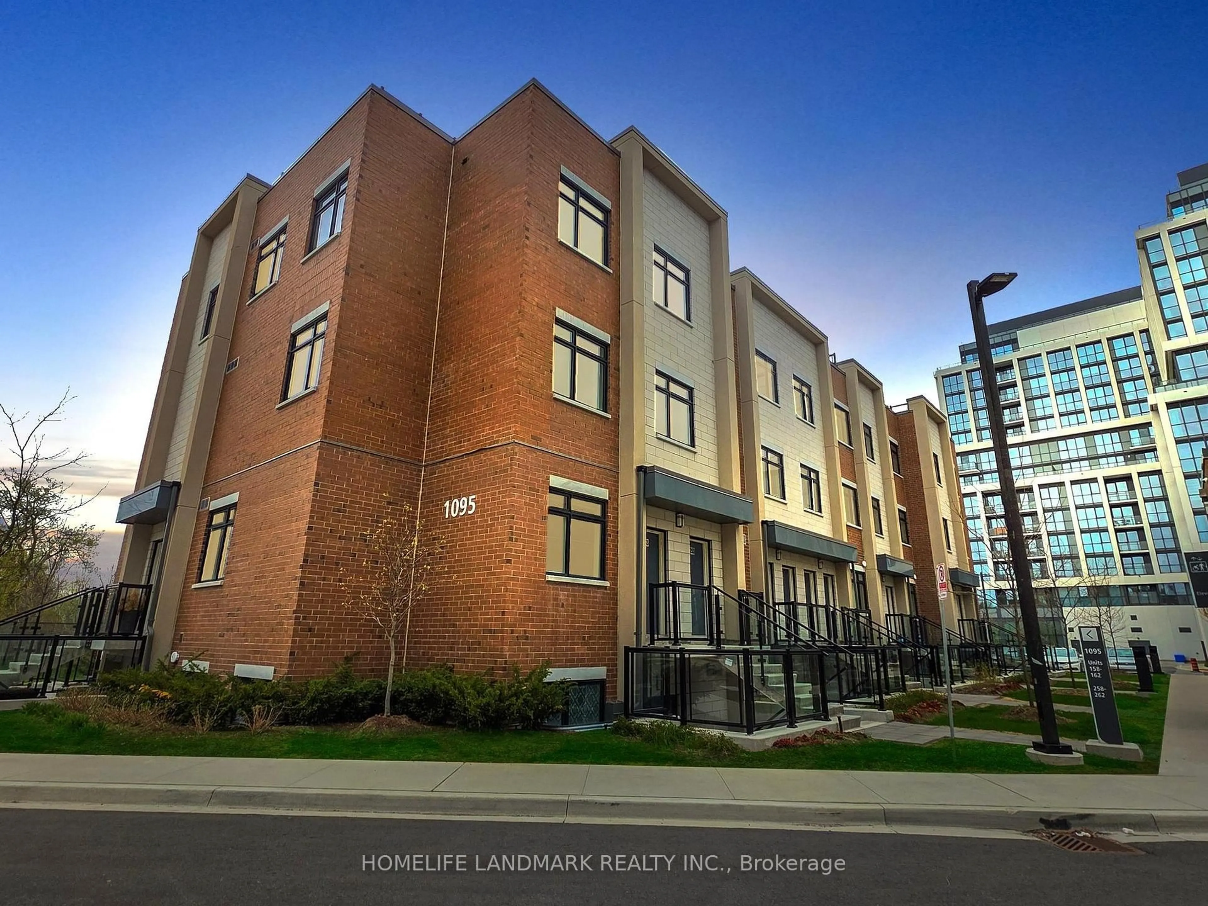Home with brick exterior material, street for 1095 Douglas McCurdy Common #254, Mississauga Ontario L5G 0C6