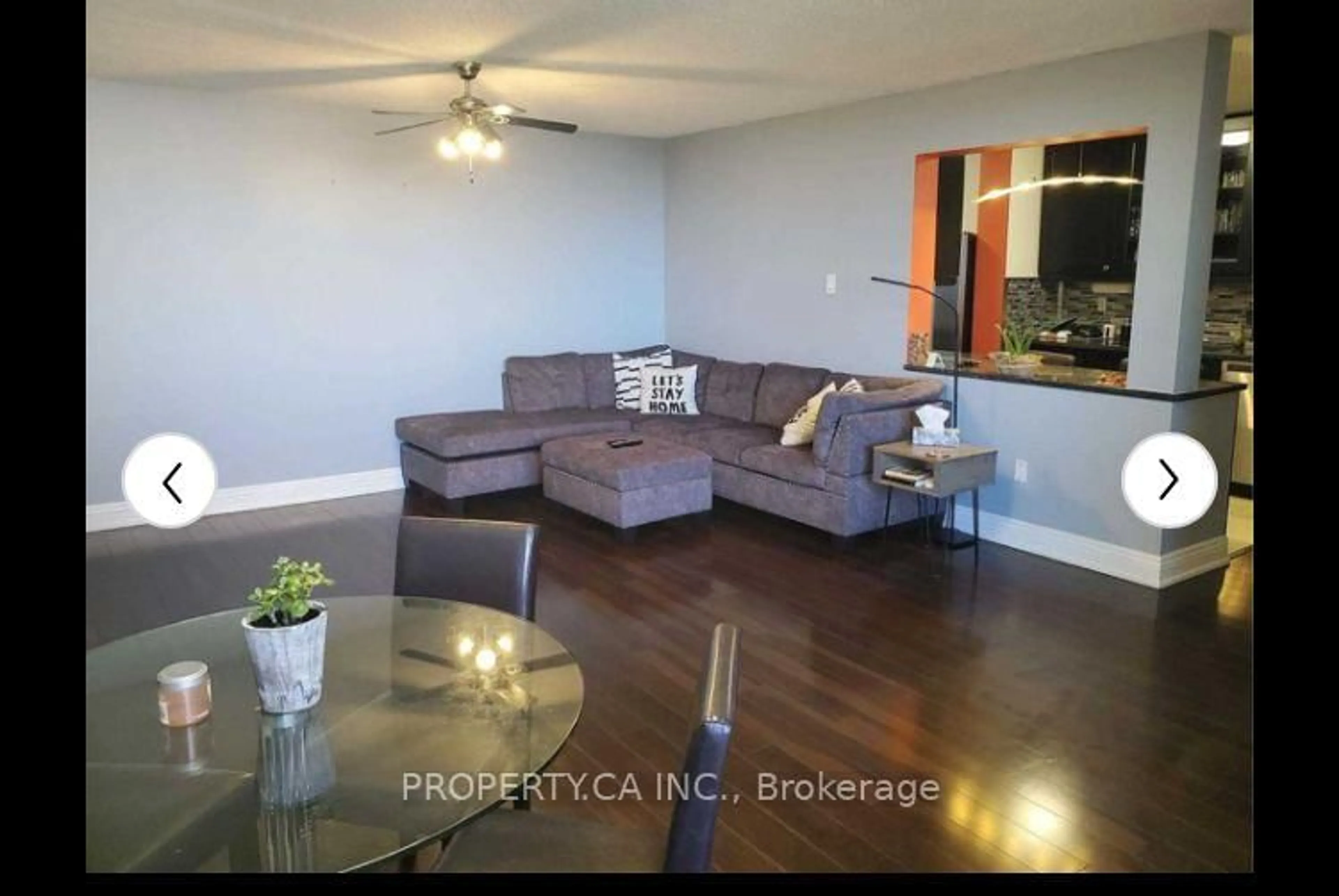 Living room with furniture, wood/laminate floor for 1515 Lakeshore Rd #PH5, Mississauga Ontario L5E 3E2