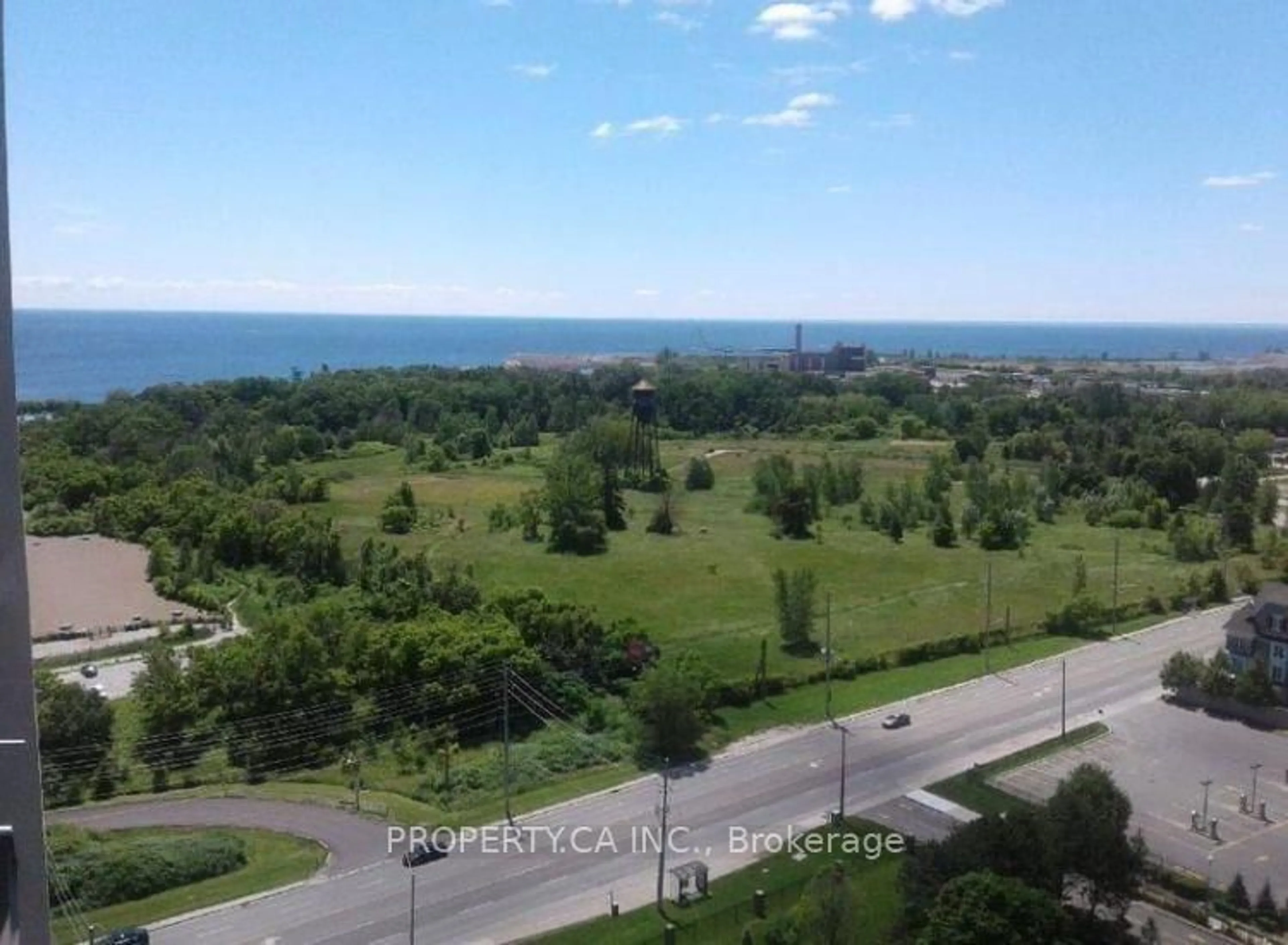 A pic from outside/outdoor area/front of a property/back of a property/a pic from drone, water/lake/river/ocean view for 1515 Lakeshore Rd #PH5, Mississauga Ontario L5E 3E2