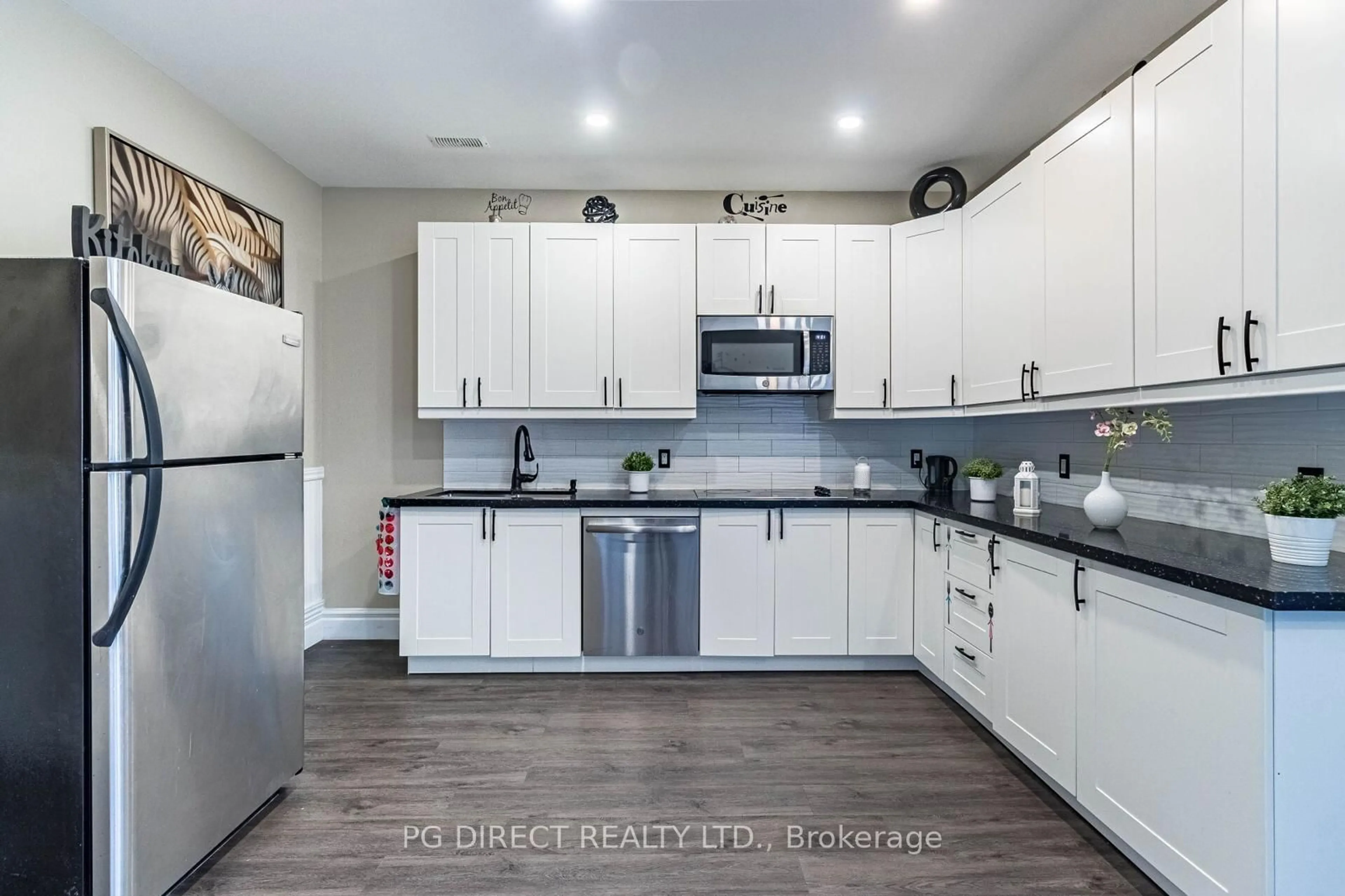 Open concept kitchen, unknown for 17 Montcalm Ave, Toronto Ontario M6E 4N5