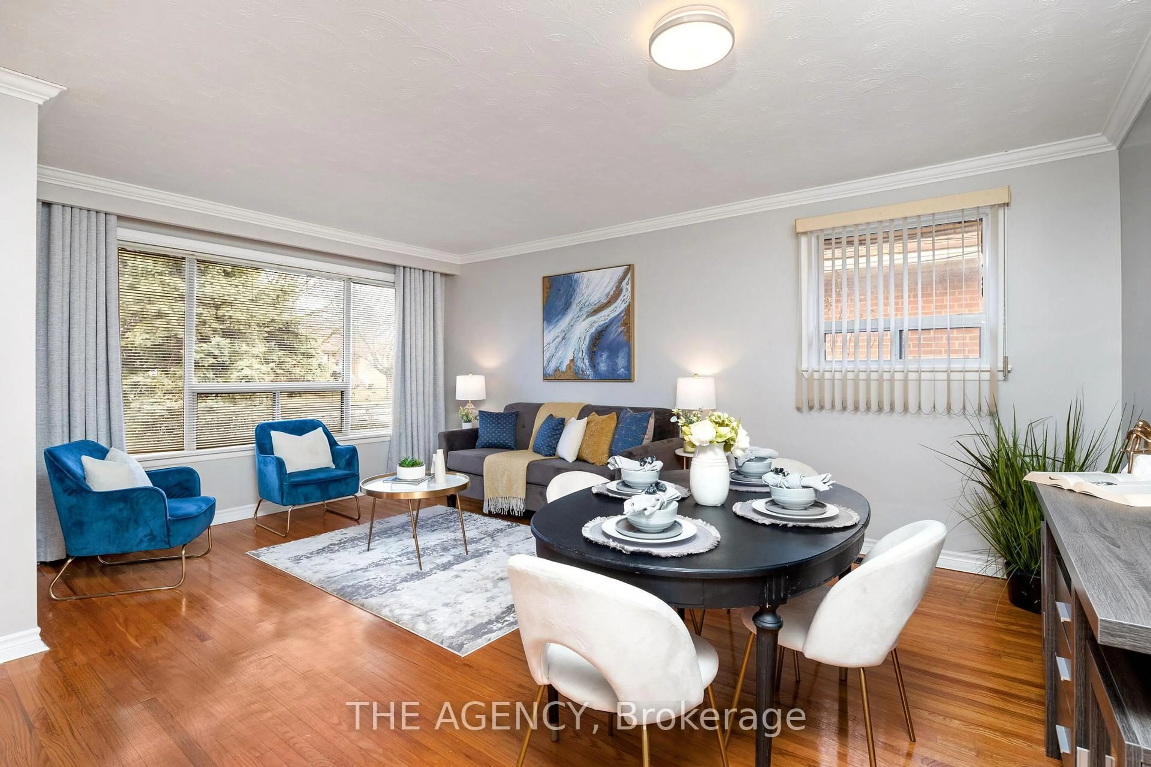 Living room with furniture, wood/laminate floor for 85 Post Rd, Brampton Ontario L6V 1X3