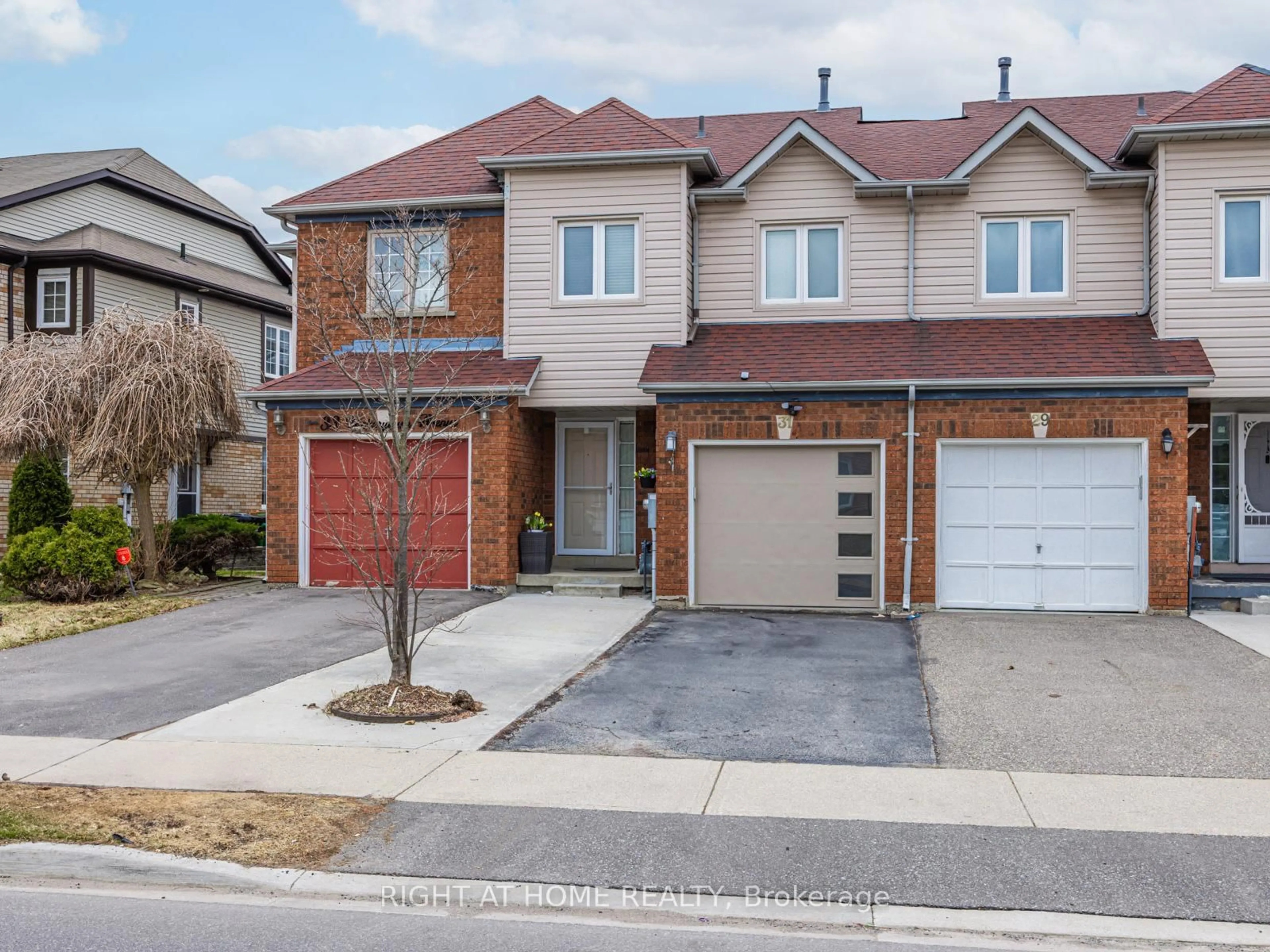 Home with brick exterior material, street for 31 Hickorybush Ave, Brampton Ontario L6R 1C7