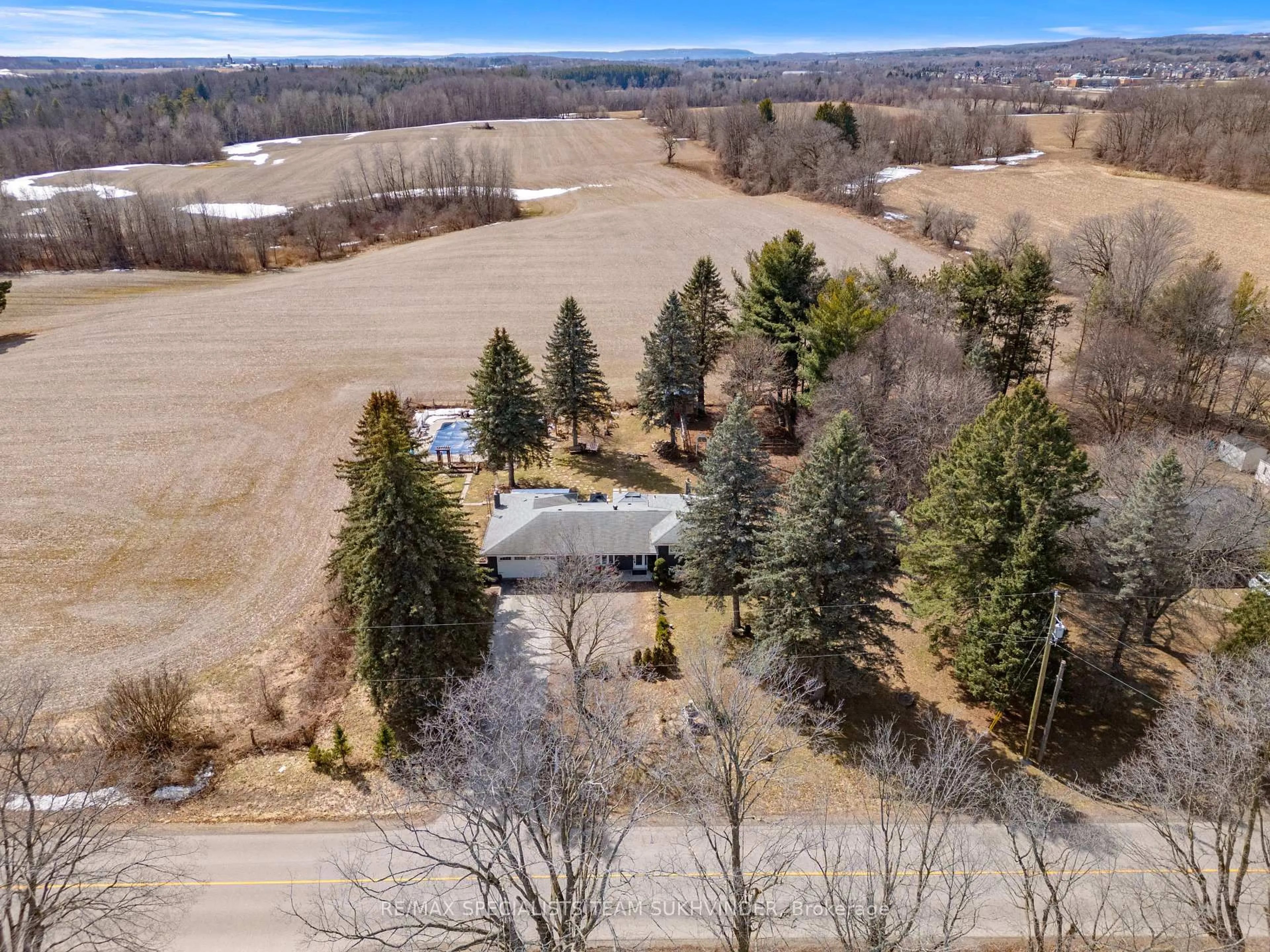 A pic from outside/outdoor area/front of a property/back of a property/a pic from drone, forest/trees view for 15768 Centreville Creek Rd, Caledon Ontario L7C 3B3