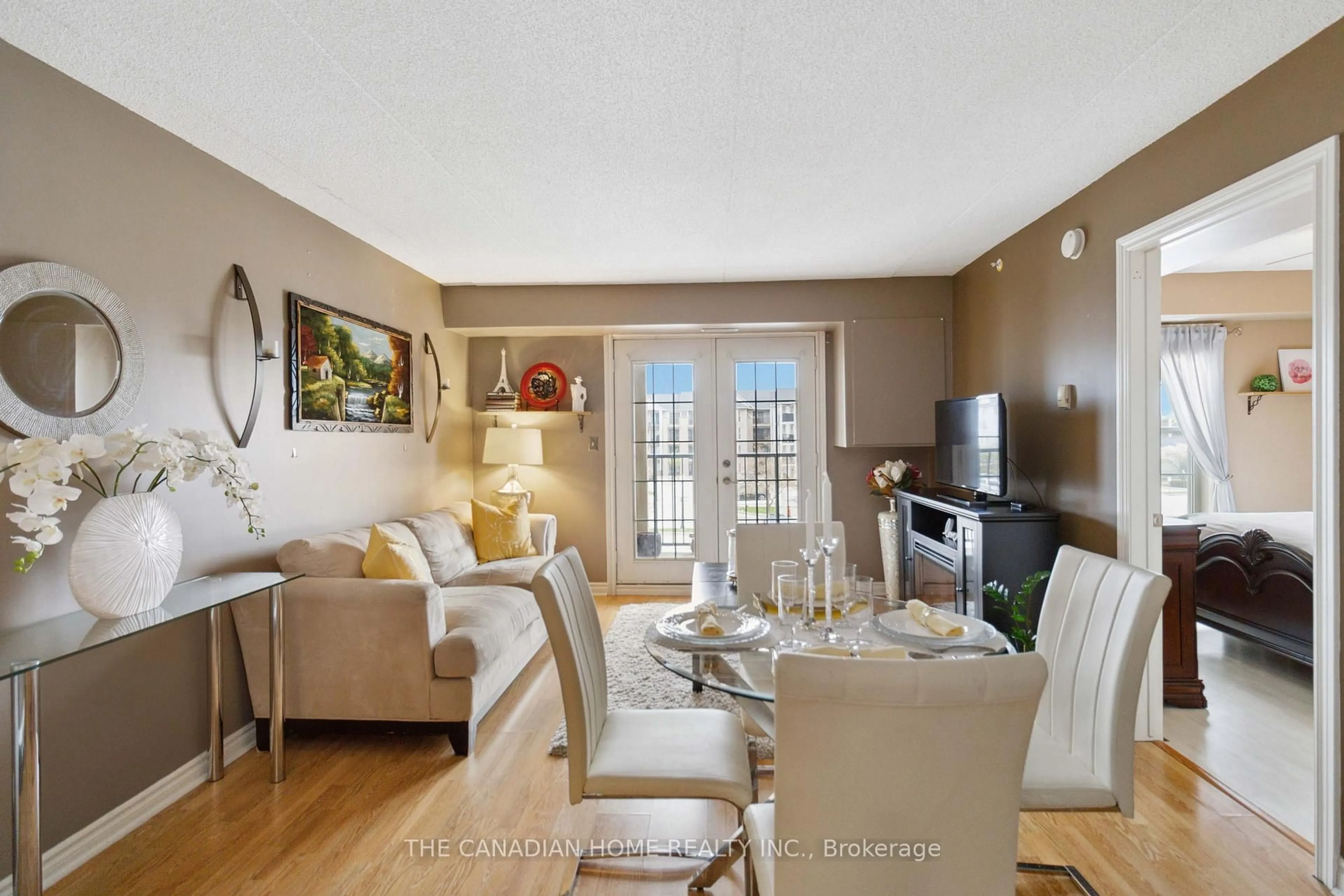 Living room with furniture, unknown for 1441 Walkers Line #304, Burlington Ontario L7M 4P2