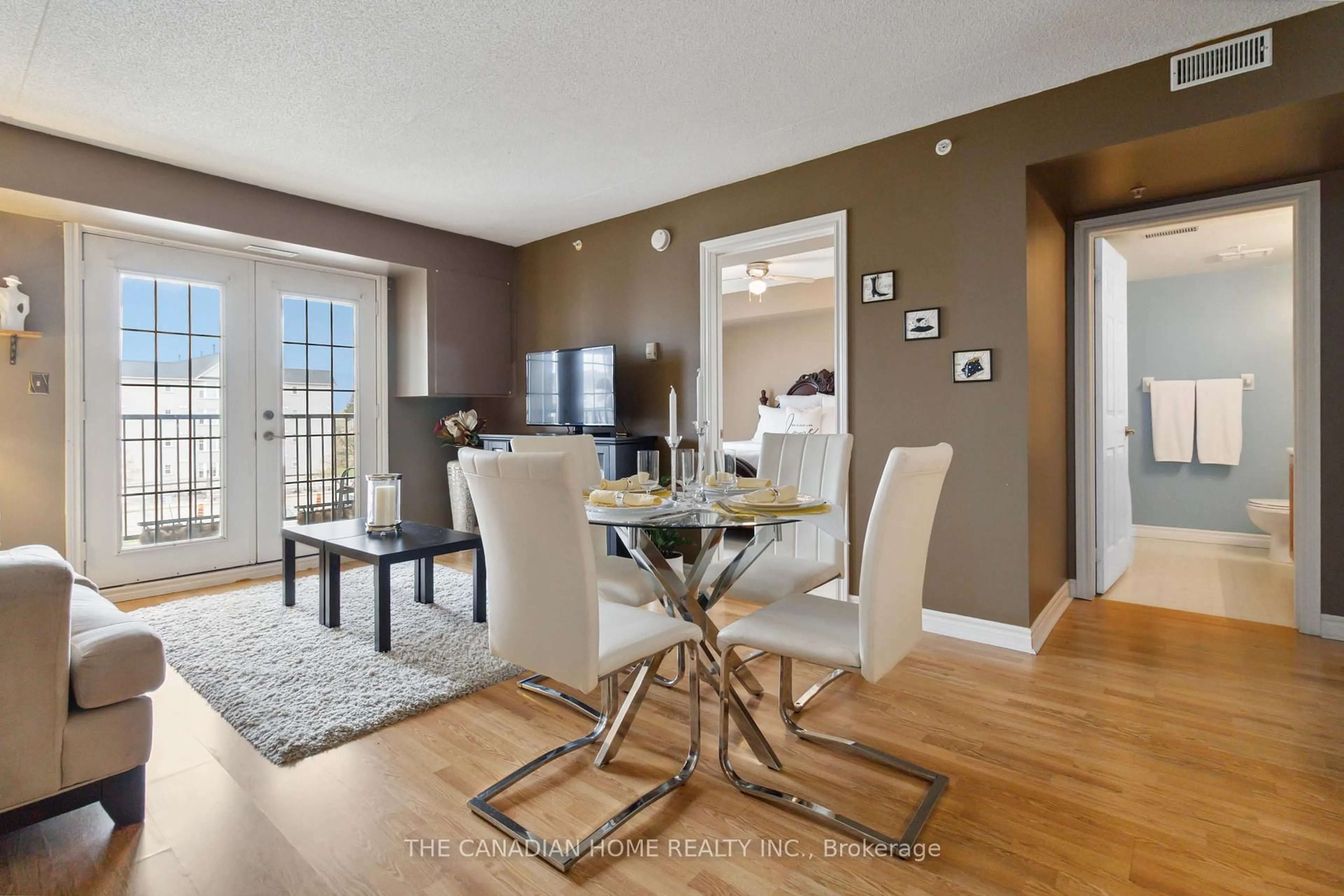 Dining room, wood/laminate floor for 1441 Walkers Line #304, Burlington Ontario L7M 4P2