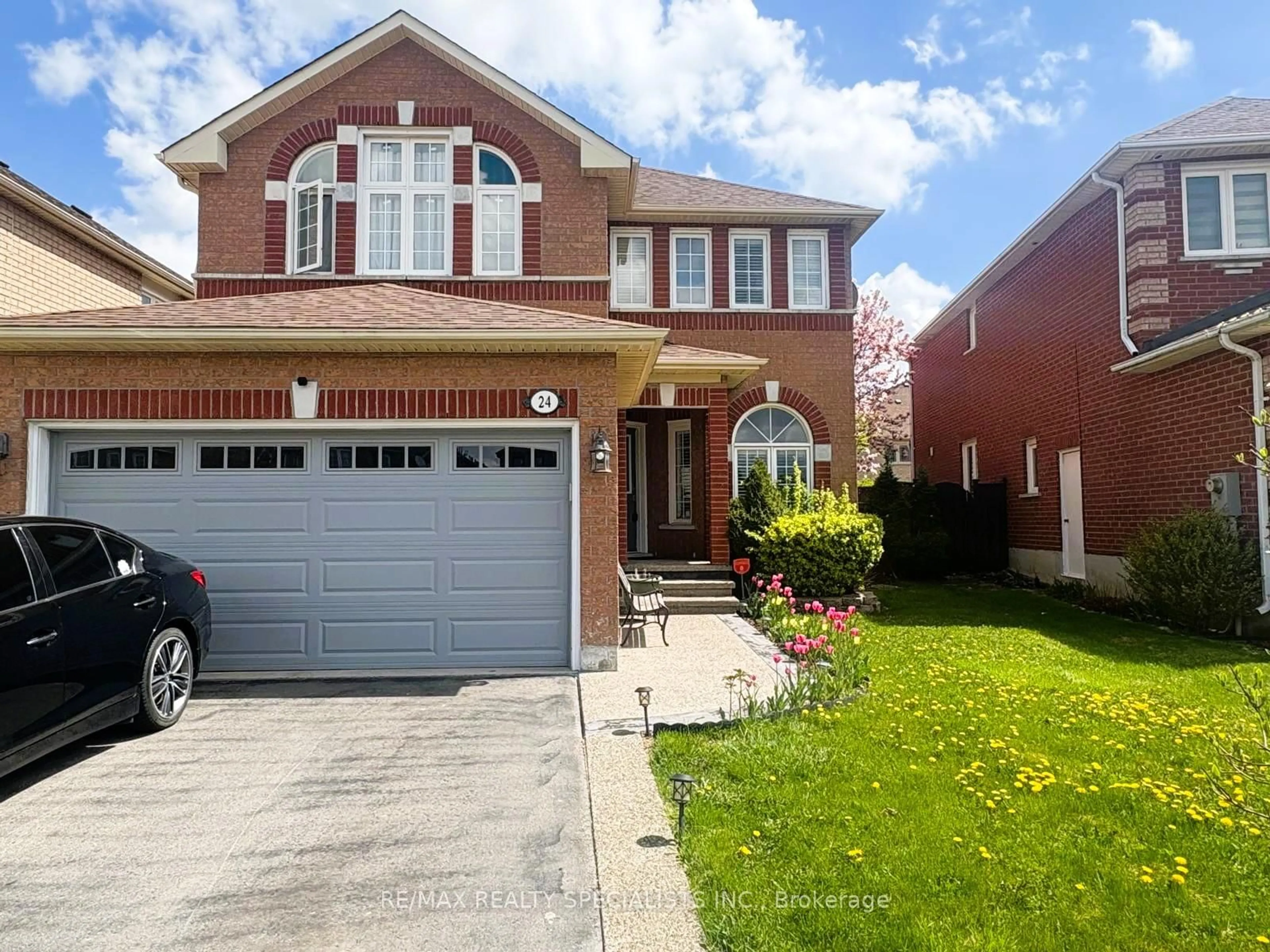 Home with brick exterior material, street for 24 Arthurs Cres, Brampton Ontario L6Y 4Y2