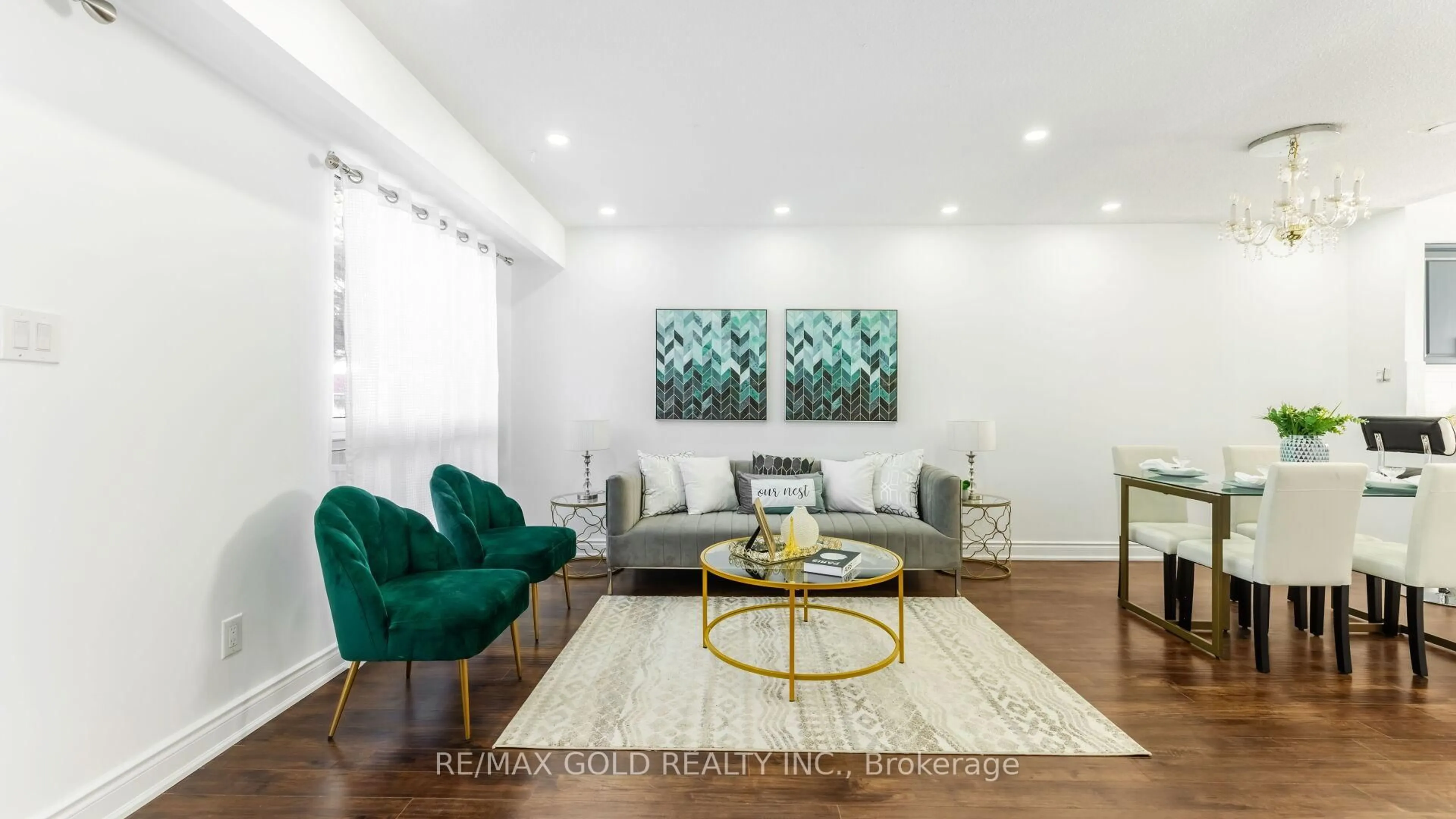 Living room with furniture, wood/laminate floor for 7560 Goreway Dr #18, Mississauga Ontario L4T 2V2