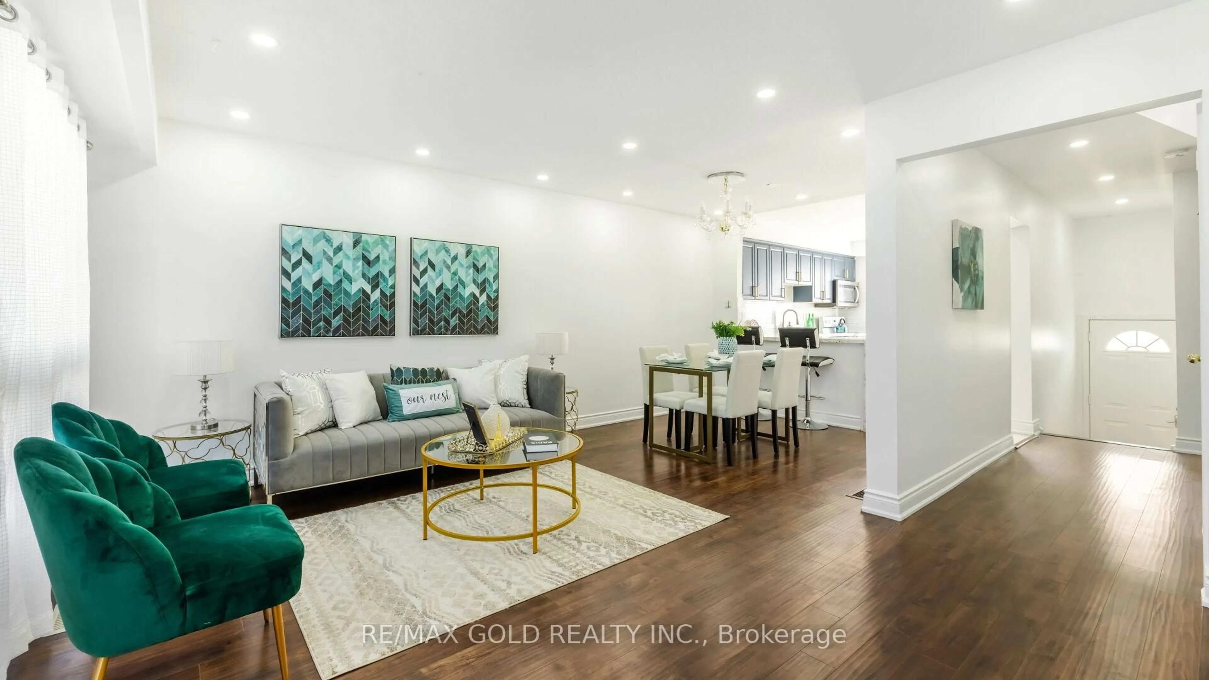 Living room with furniture, wood/laminate floor for 7560 Goreway Dr #18, Mississauga Ontario L4T 2V2