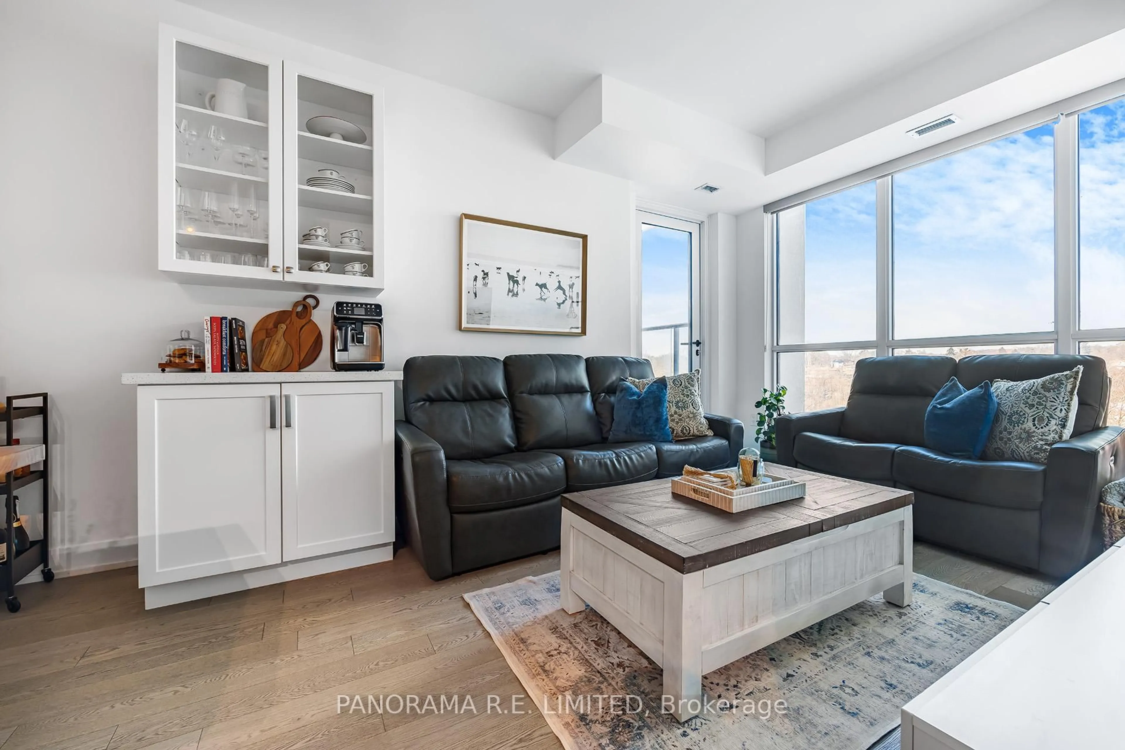 Living room with furniture, unknown for 1063 Douglas McCurdy Comm N/A #315, Mississauga Ontario L5G 0C5