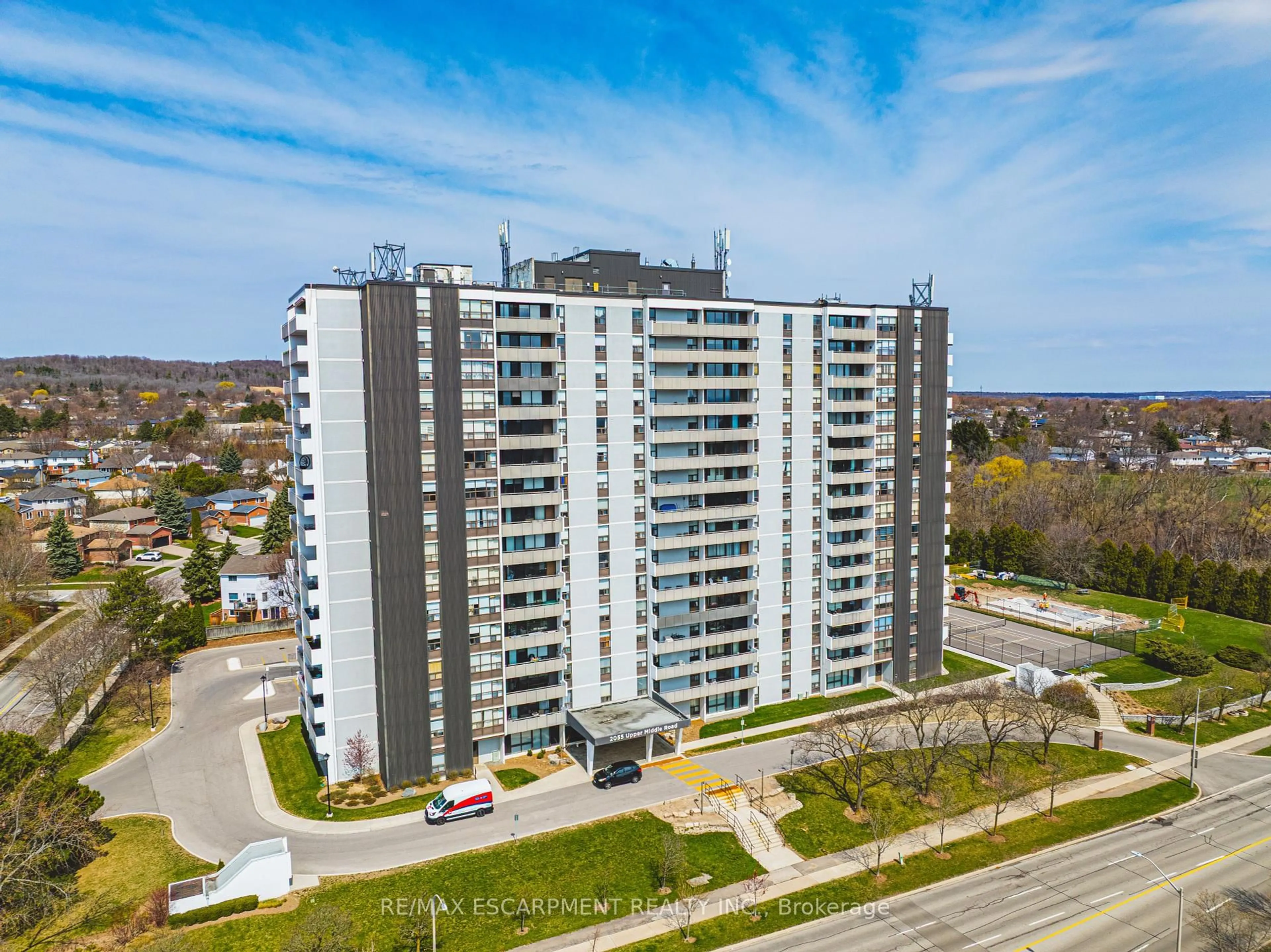 A pic from outside/outdoor area/front of a property/back of a property/a pic from drone, city buildings view from balcony for 2055 Upper Middle Rd #706, Burlington Ontario L7P 3P4
