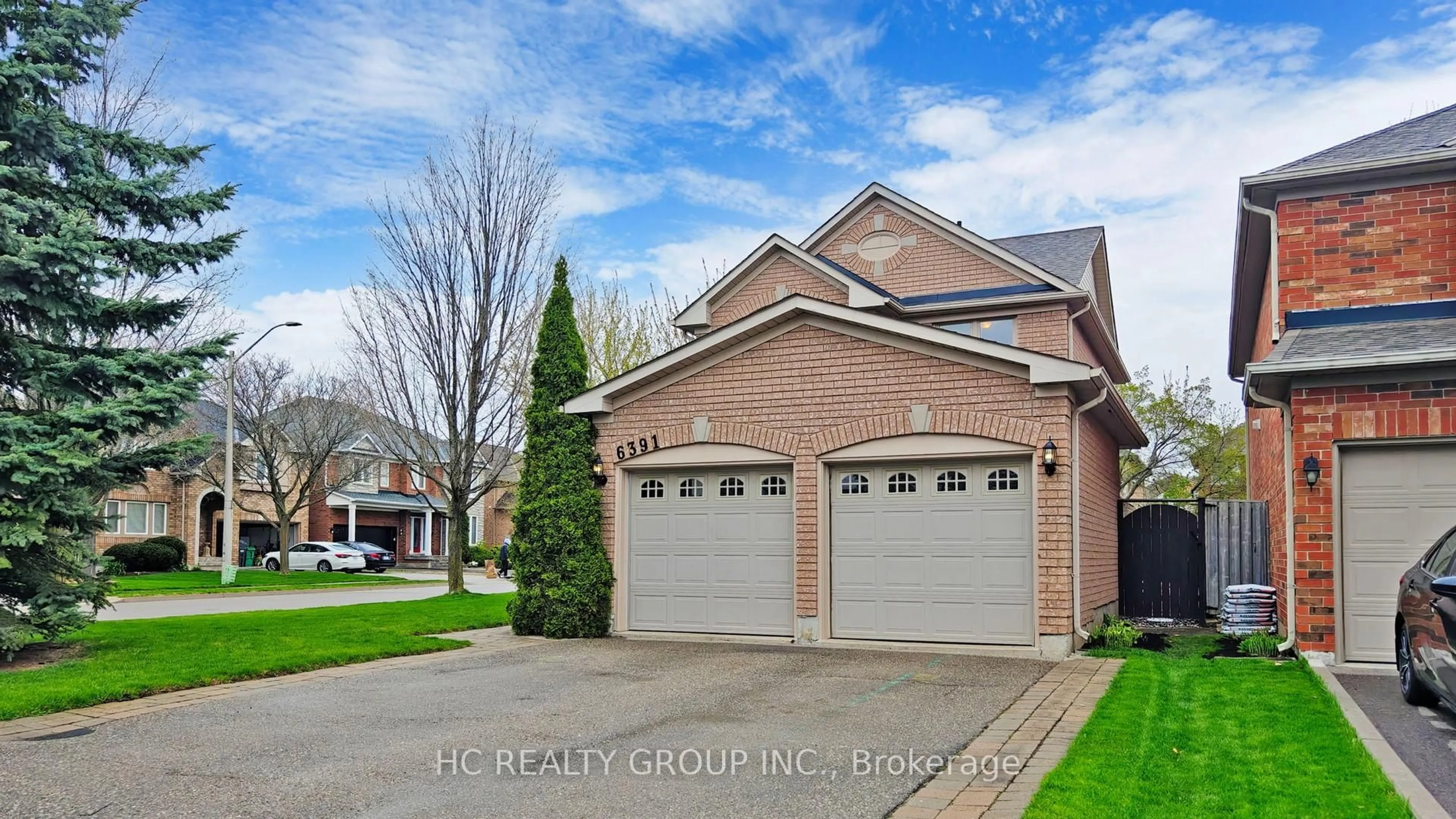 Home with brick exterior material, street for 6391 Amber Glen Dr, Mississauga Ontario L5N 7V9