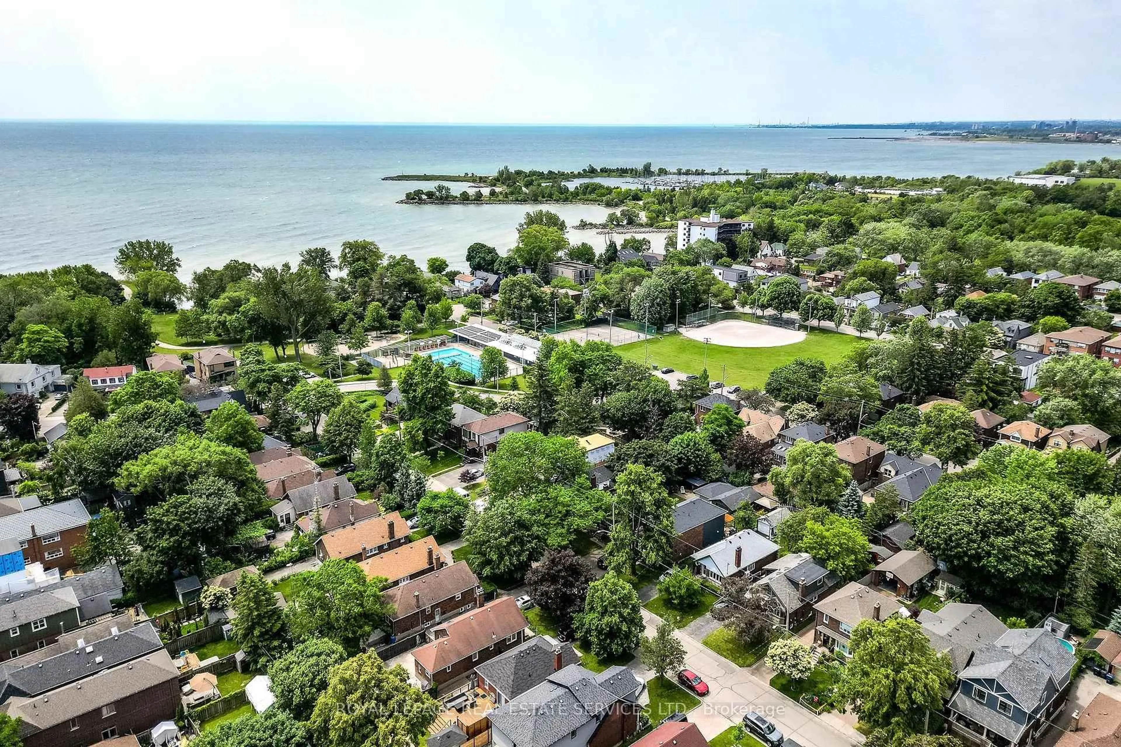 A pic from outside/outdoor area/front of a property/back of a property/a pic from drone, water/lake/river/ocean view for 19 Tenth St, Toronto Ontario M8V 3E7