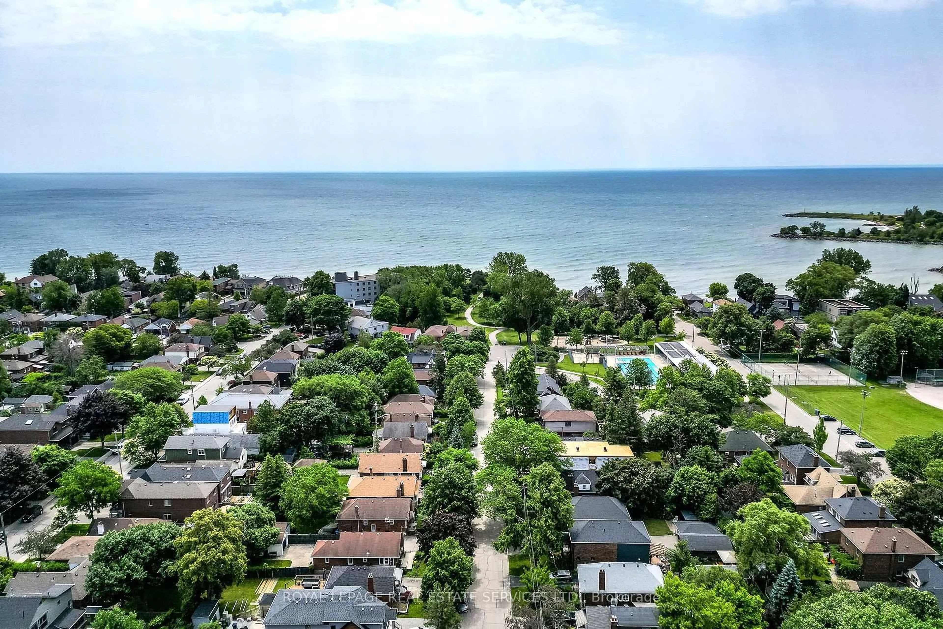 A pic from outside/outdoor area/front of a property/back of a property/a pic from drone, water/lake/river/ocean view for 19 Tenth St, Toronto Ontario M8V 3E7