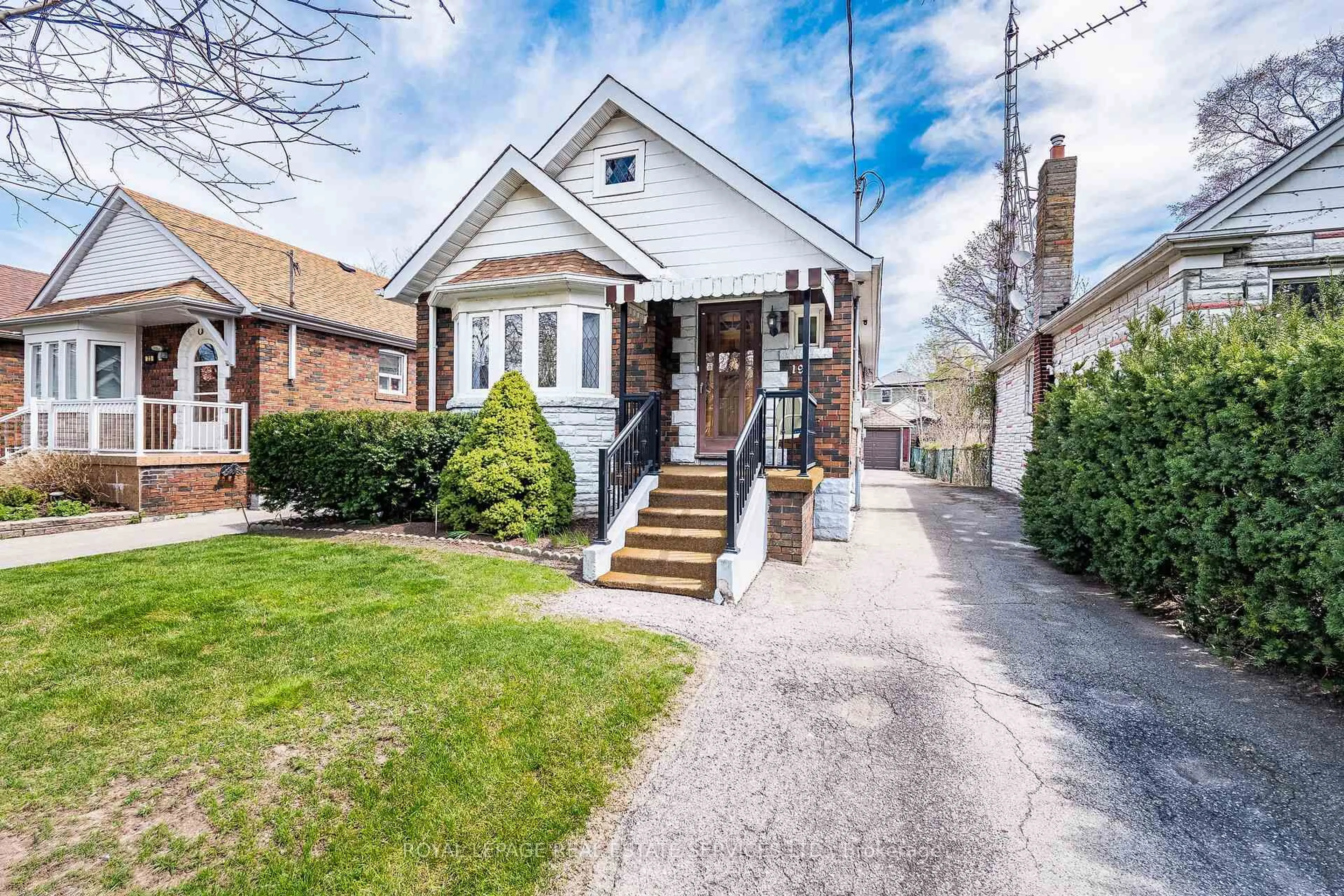 Home with brick exterior material, street for 19 Tenth St, Toronto Ontario M8V 3E7