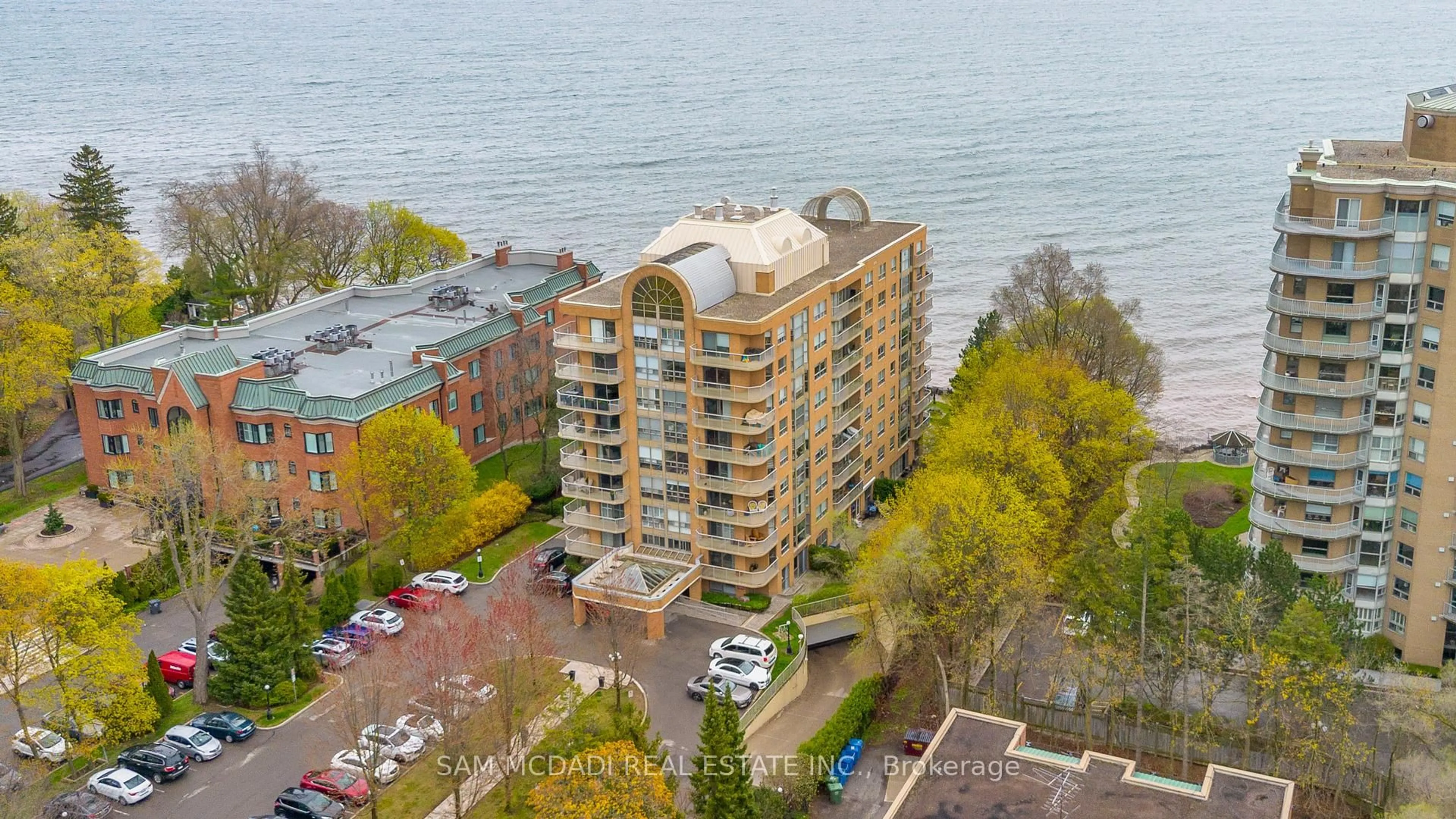 A pic from outside/outdoor area/front of a property/back of a property/a pic from drone, water/lake/river/ocean view for 2210 Lakeshore Rd #401, Burlington Ontario L7R 4J9