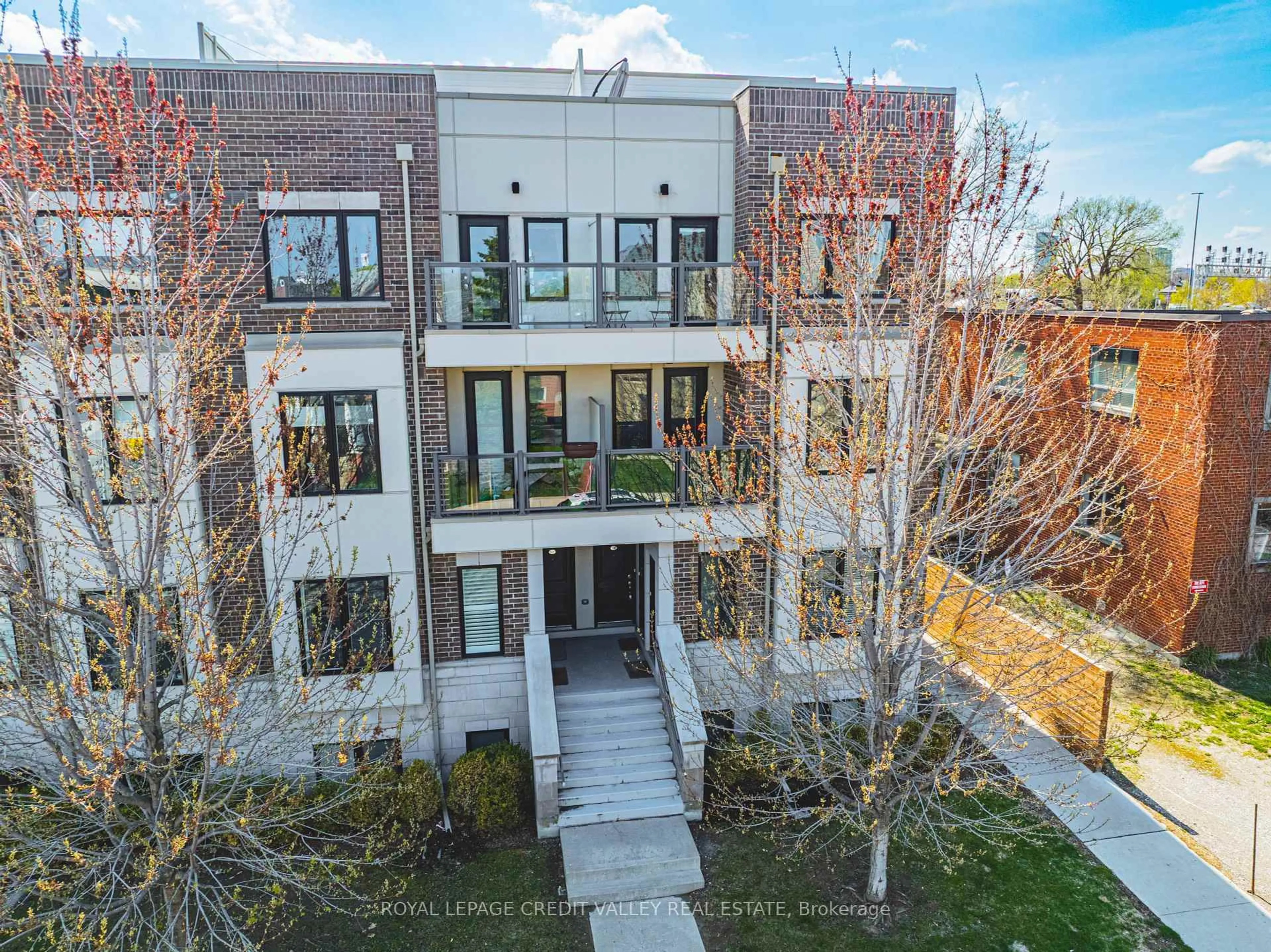 A pic from outside/outdoor area/front of a property/back of a property/a pic from drone, building for 256 Royal York Rd #116, Toronto Ontario M8V 1Y8