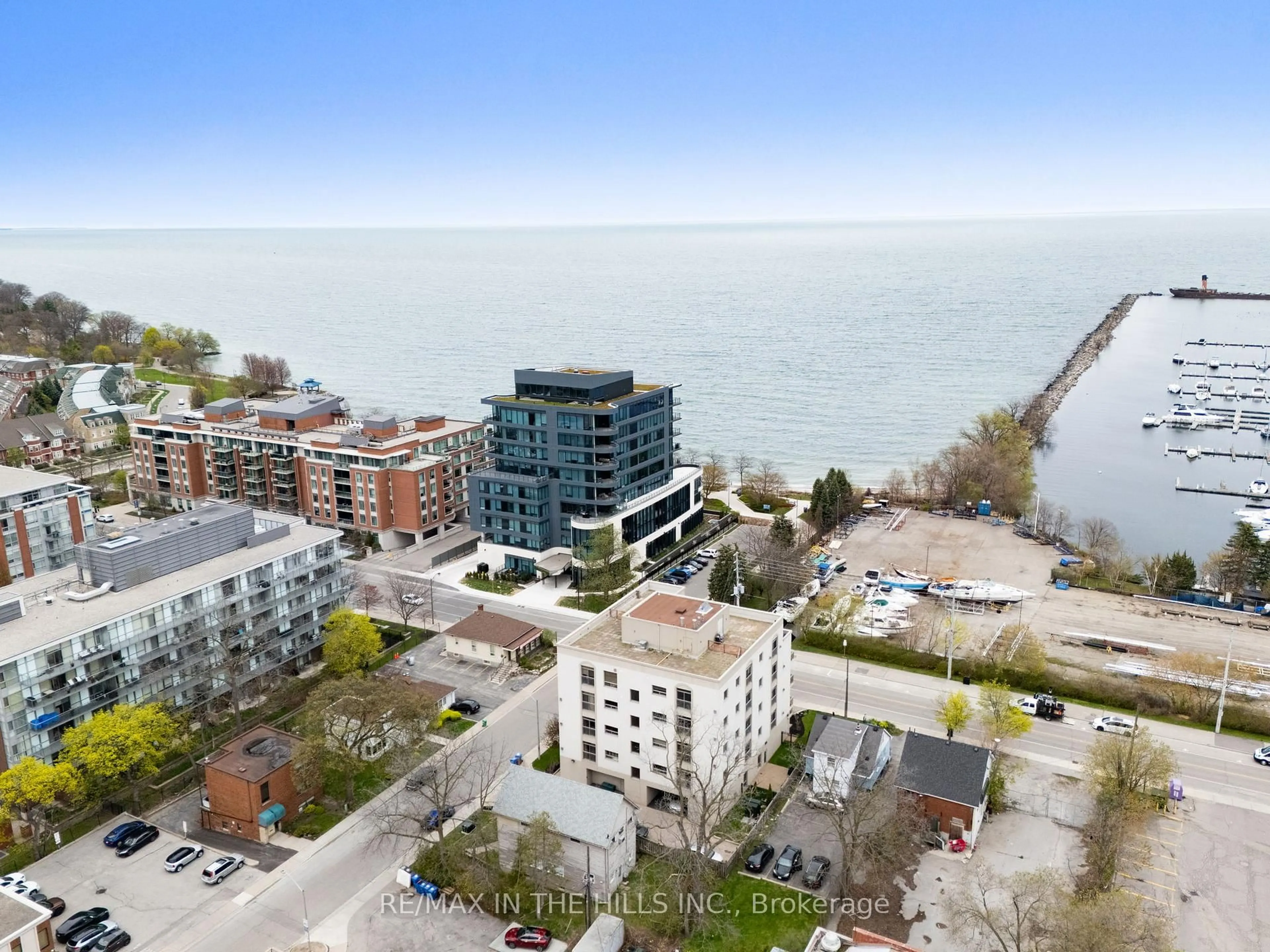 A pic from outside/outdoor area/front of a property/back of a property/a pic from drone, water/lake/river/ocean view for 50 Port St #404, Mississauga Ontario L5G 1C1