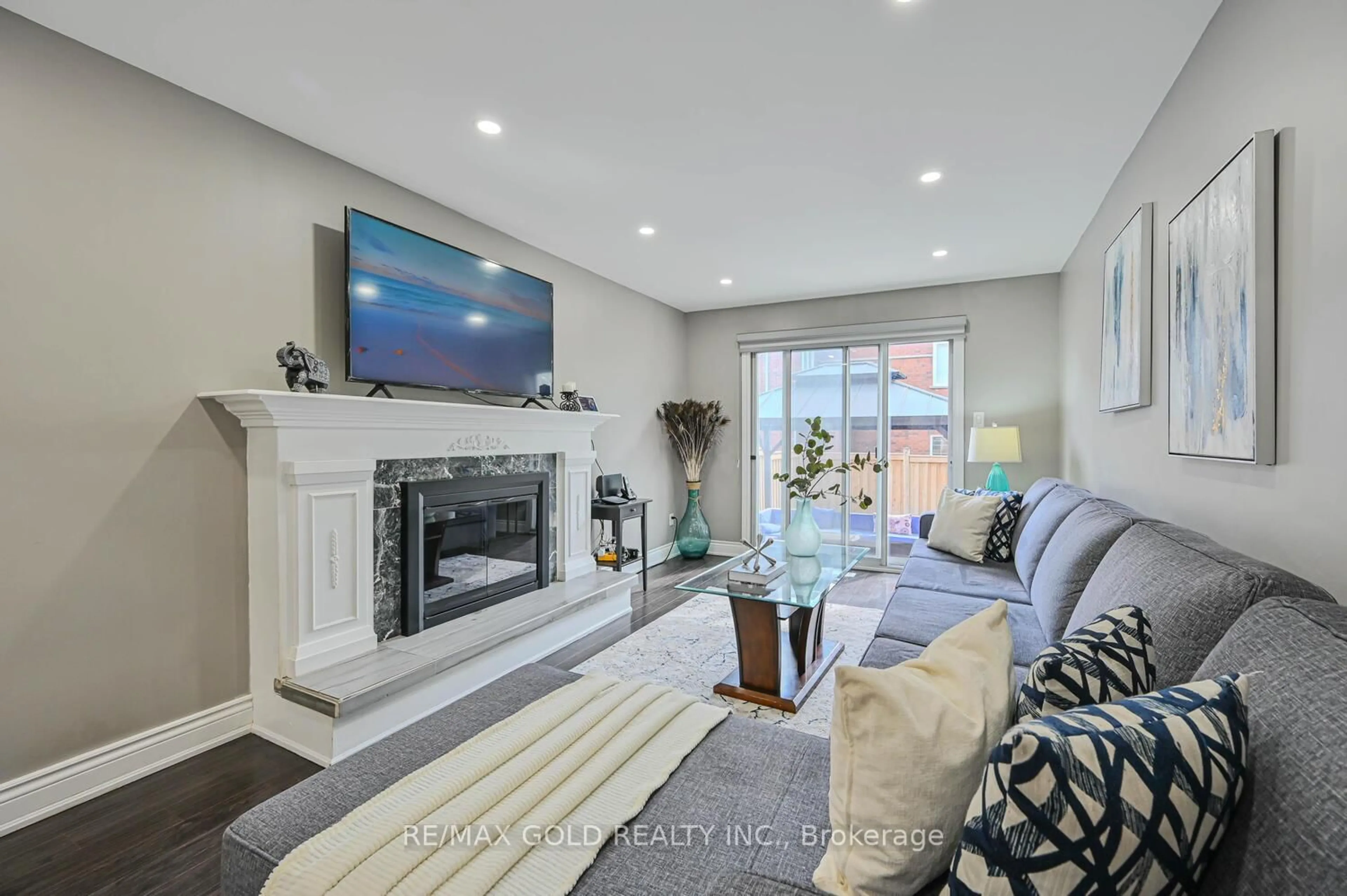 Living room with furniture, ceramic/tile floor for 12 Horned Owl Dr, Brampton Ontario L6R 1C6