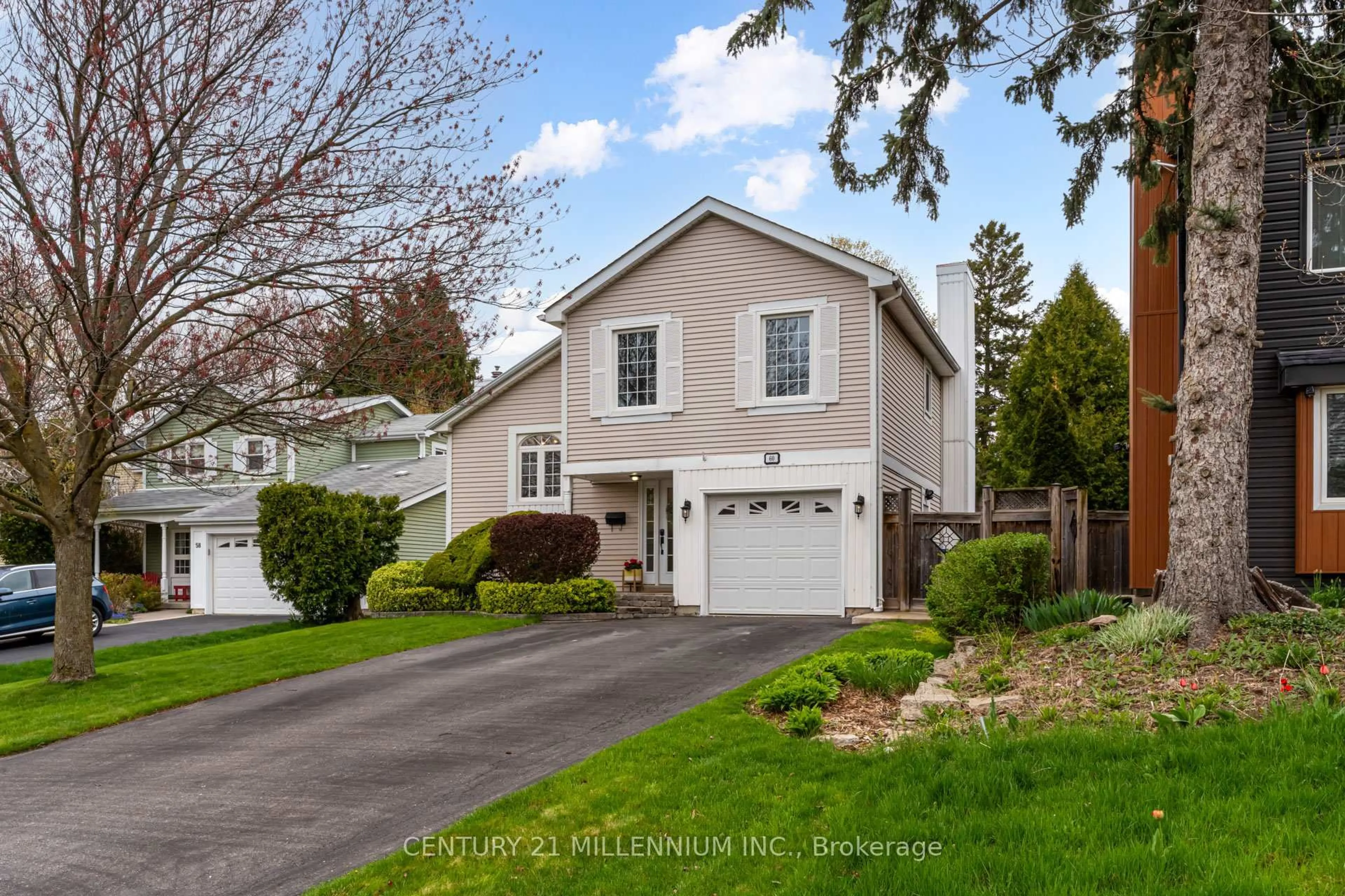 Home with vinyl exterior material, street for 60 Monterey Ave, Brampton Ontario L6Z 1B5