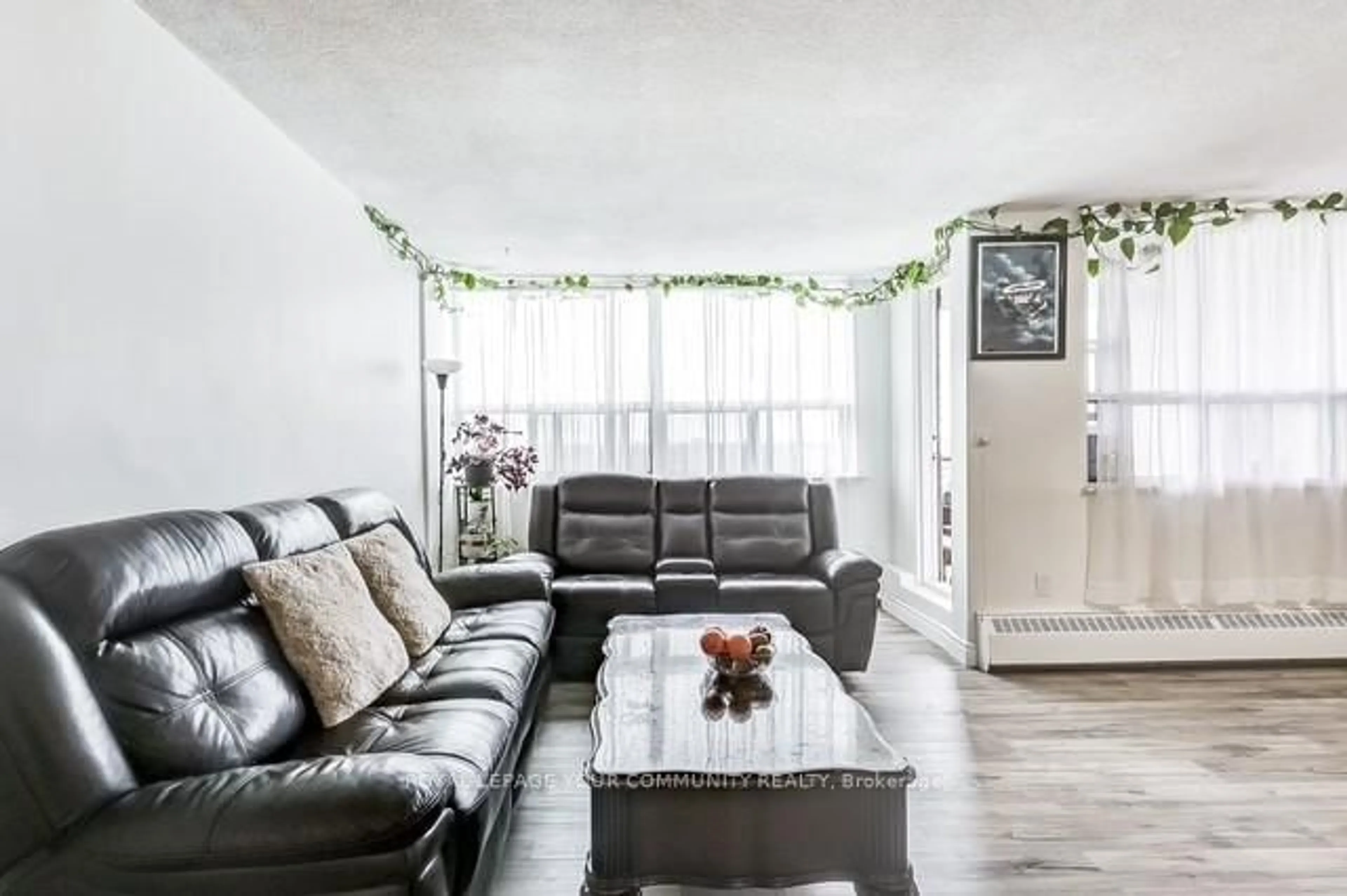 Living room with furniture, unknown for 451 The West Mall Dr #1410, Toronto Ontario M9C 1G1