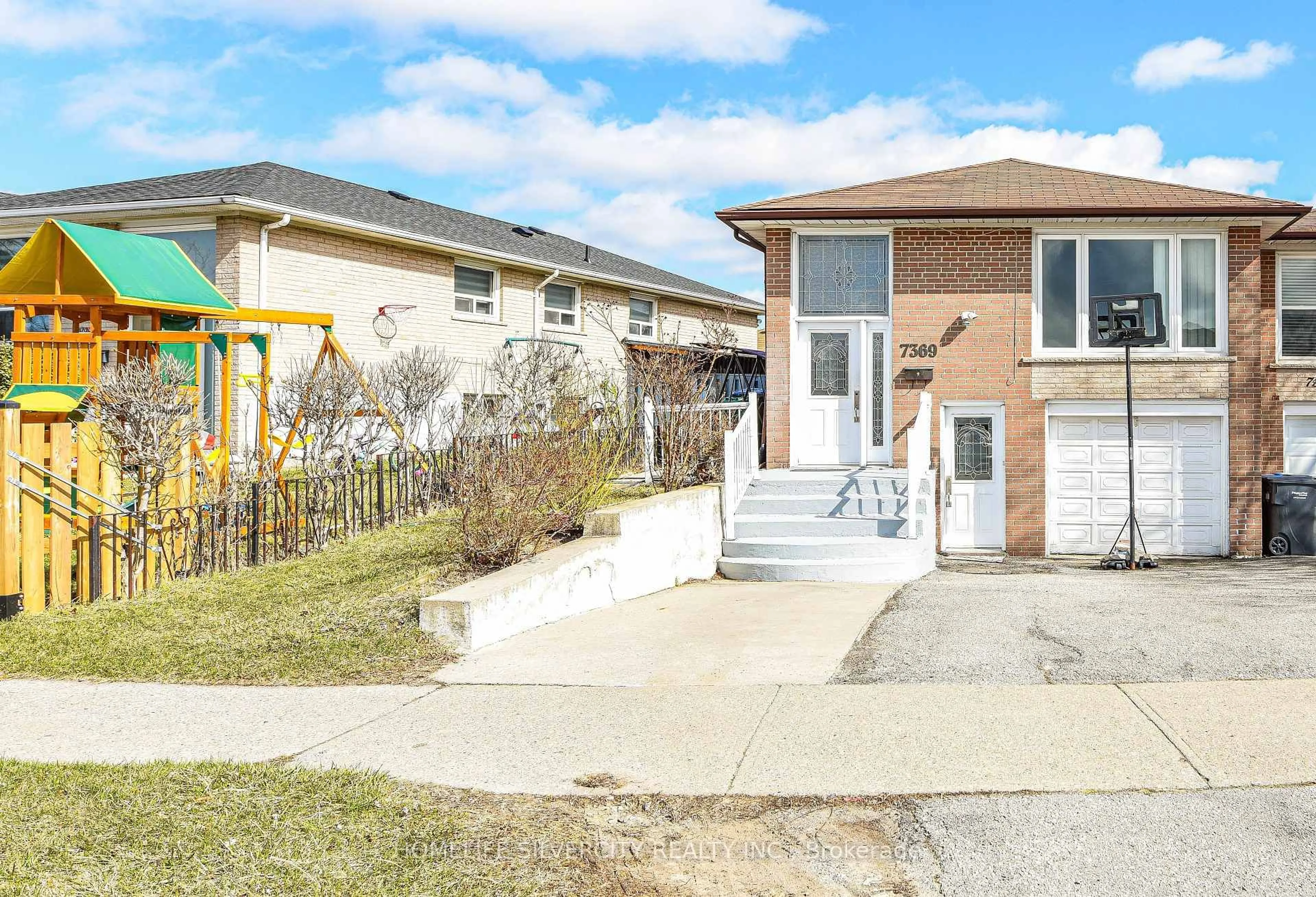 Home with brick exterior material, street for 7369 Shallford Rd, Mississauga Ontario L4T 2P9
