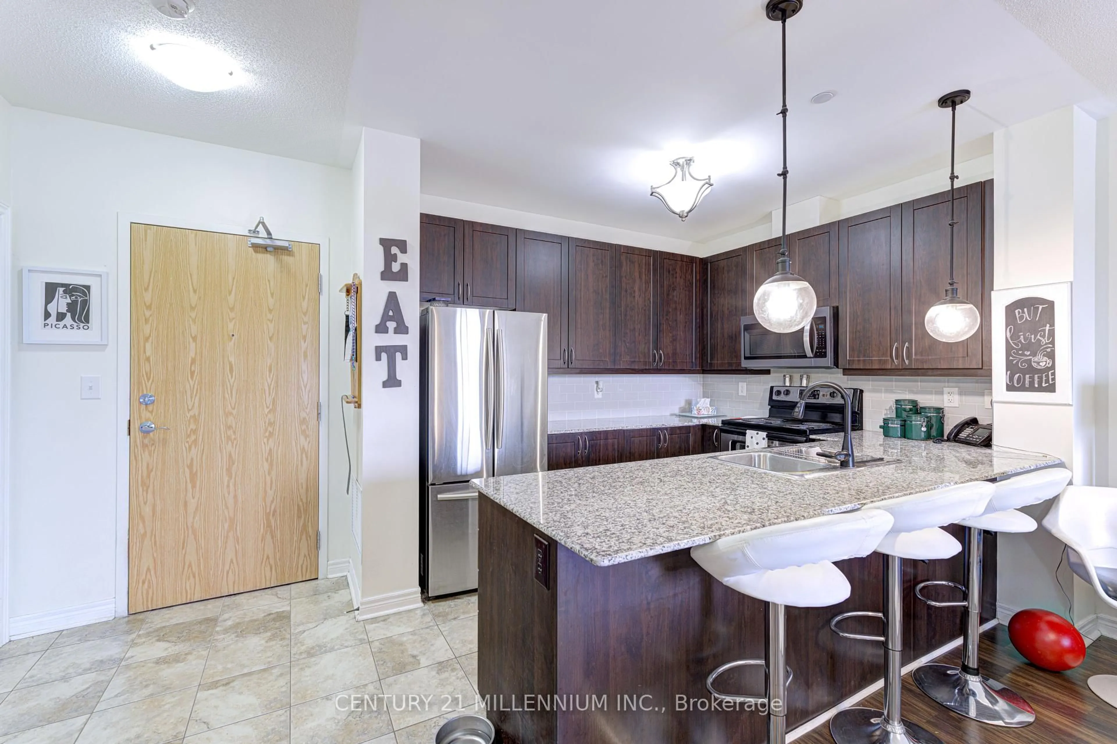 Open concept kitchen, ceramic/tile floor for 383 Main St #322, Milton Ontario L9T 8K8