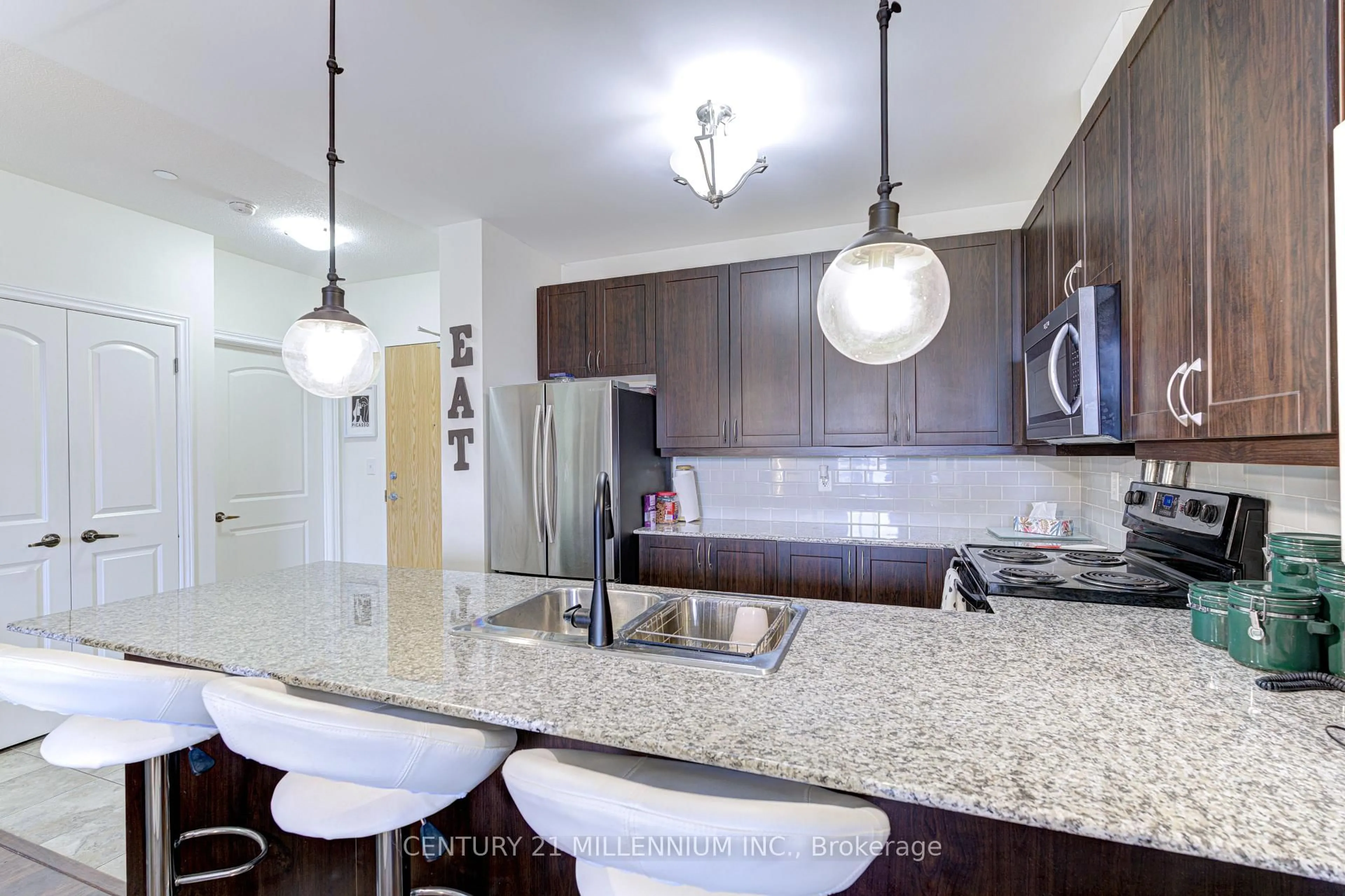 Open concept kitchen, ceramic/tile floor for 383 Main St #322, Milton Ontario L9T 8K8