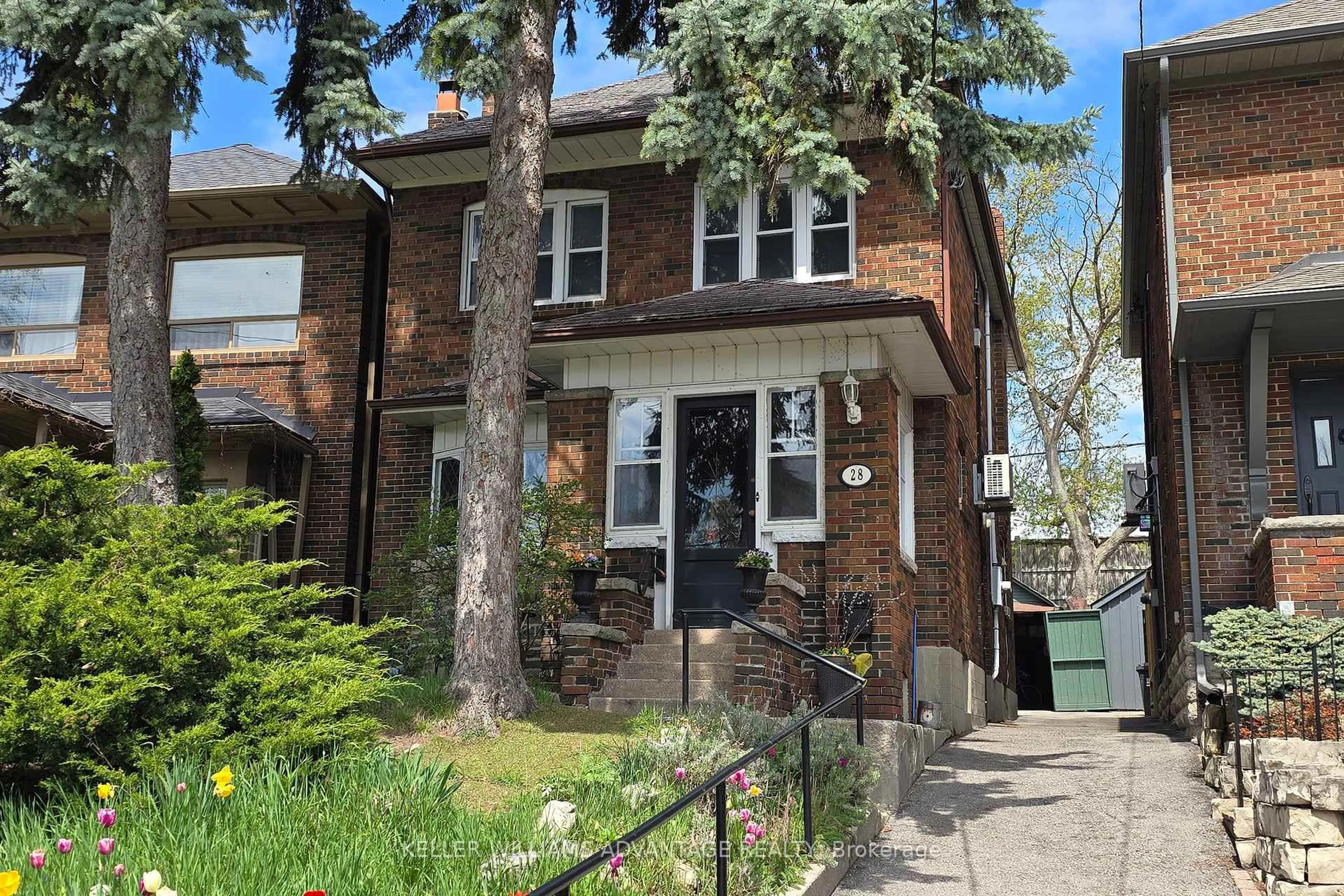 Home with brick exterior material, street for 28 Larkin Ave, Toronto Ontario M6S 1L8