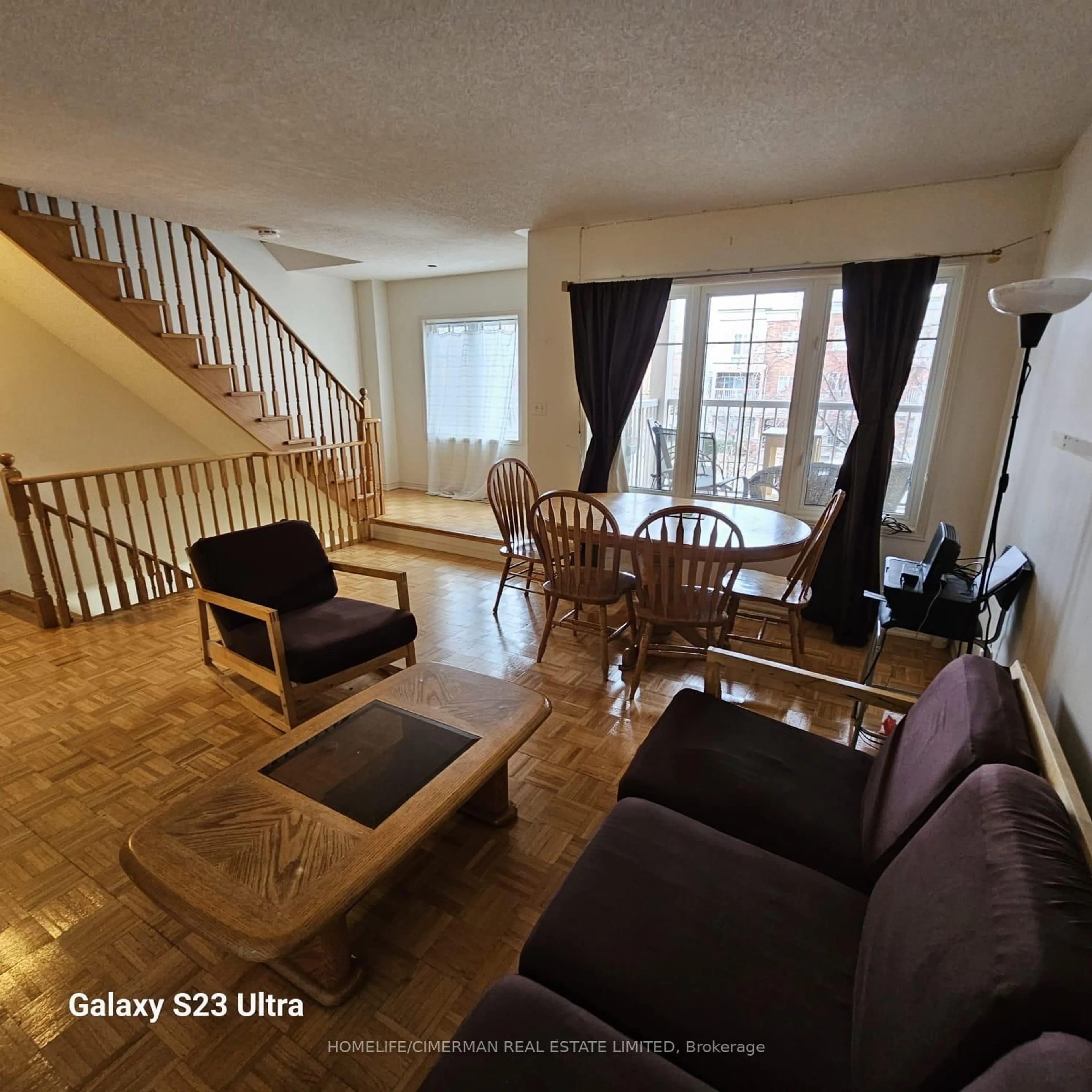 Living room with furniture, unknown for 365 Murray Ross Pkwy #16, Toronto Ontario M3J 3T7