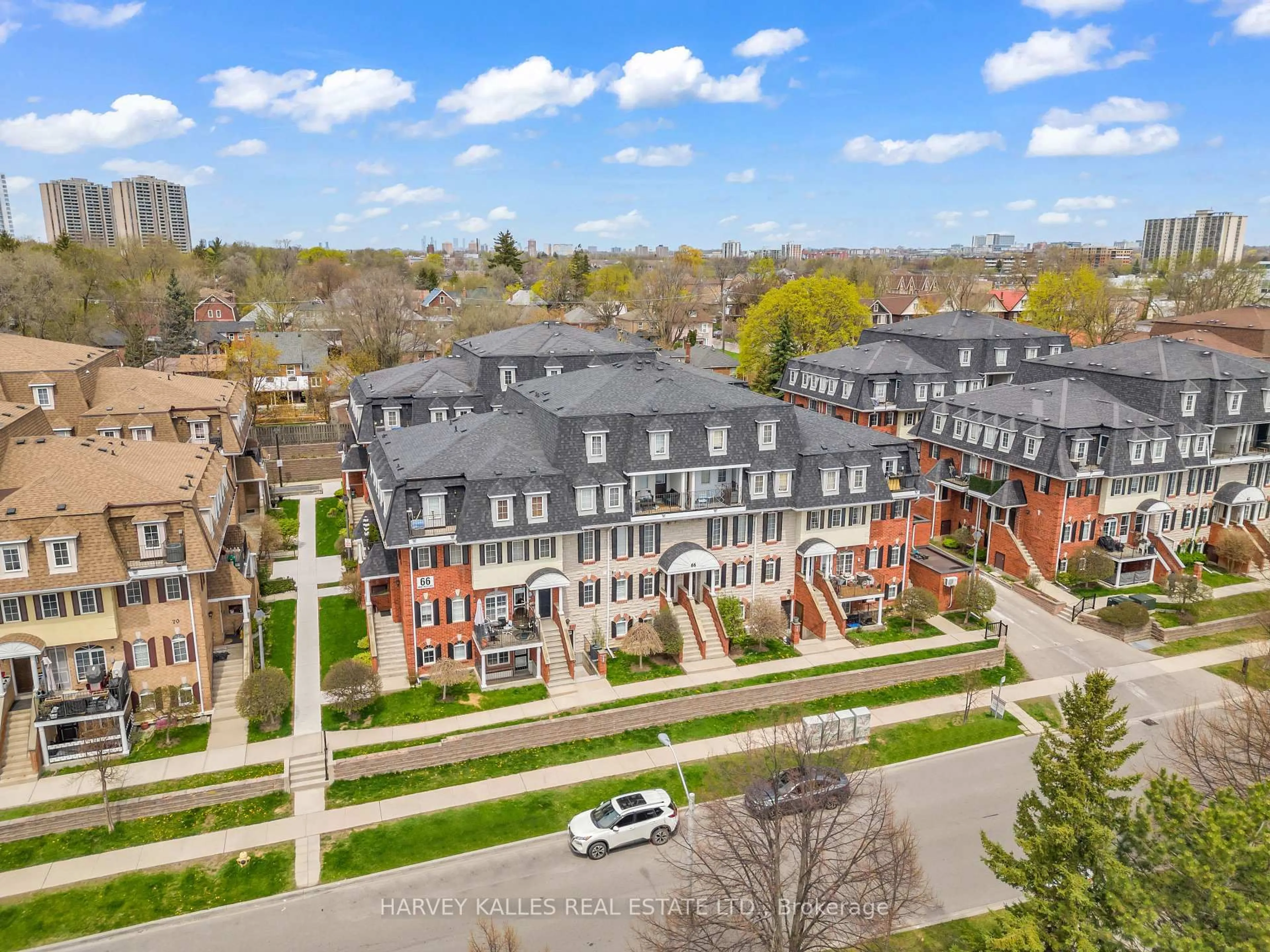 A pic from outside/outdoor area/front of a property/back of a property/a pic from drone, city buildings view from balcony for 66 Sidney Belsey Cres #201, Toronto Ontario M6M 5J4