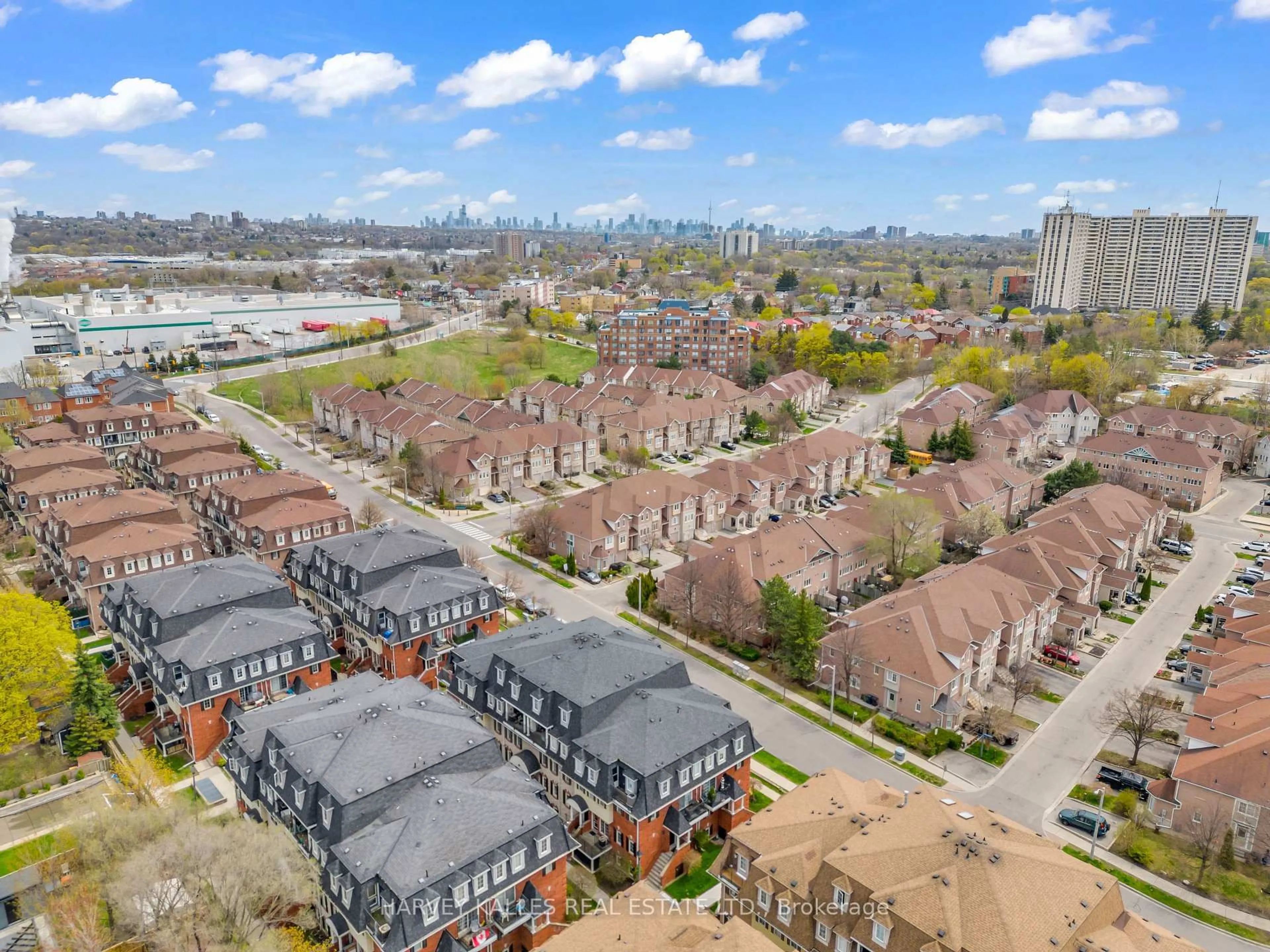 A pic from outside/outdoor area/front of a property/back of a property/a pic from drone, city buildings view from balcony for 66 Sidney Belsey Cres #201, Toronto Ontario M6M 5J4
