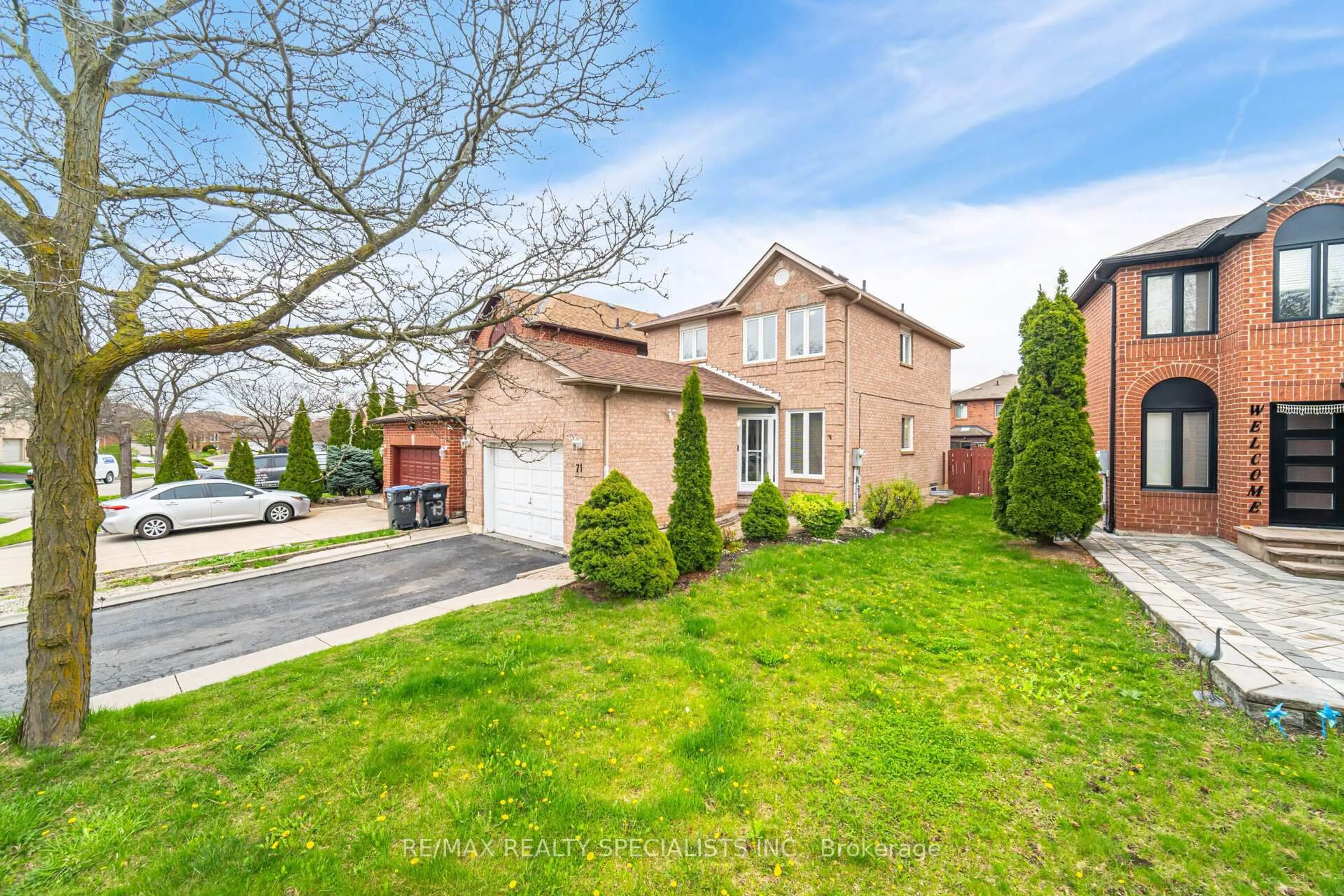 Home with brick exterior material, street for 71 Cedarwood Cres, Brampton Ontario L6X 4K2