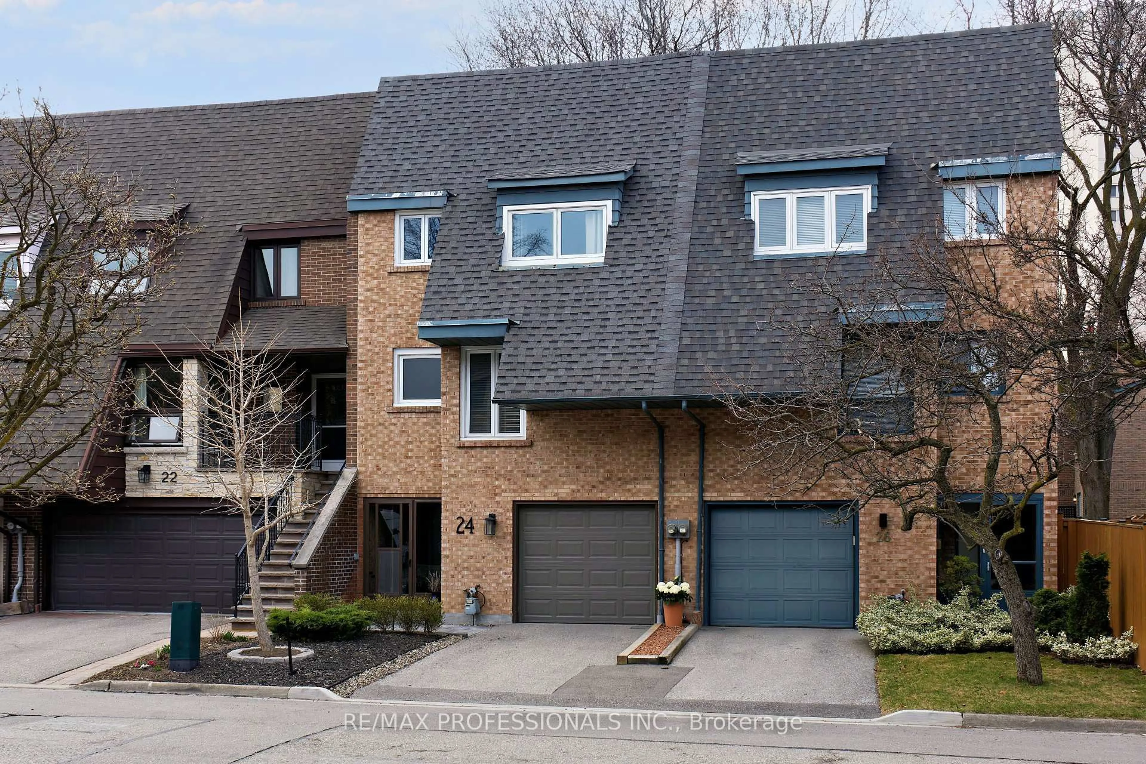 Home with brick exterior material, street for 24 Stoneham Rd, Toronto Ontario M9C 4Y8