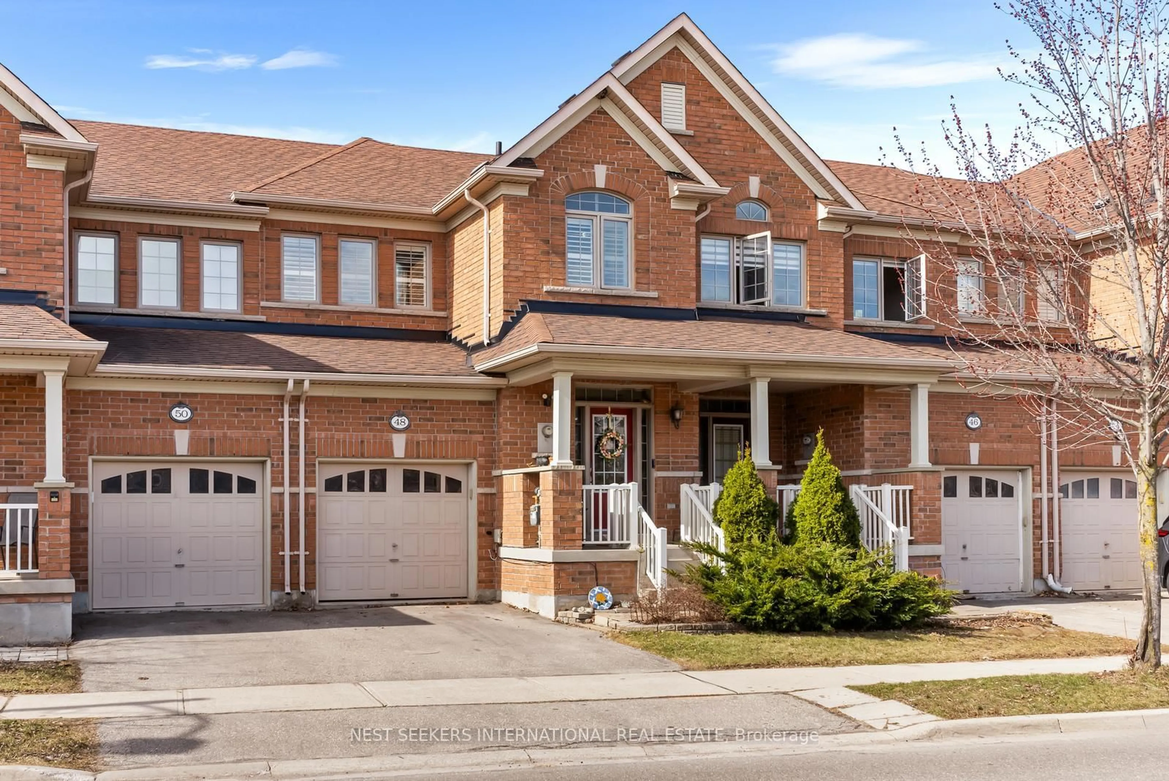 Home with brick exterior material, street for 48 Whitmer St, Milton Ontario L9T 0R5