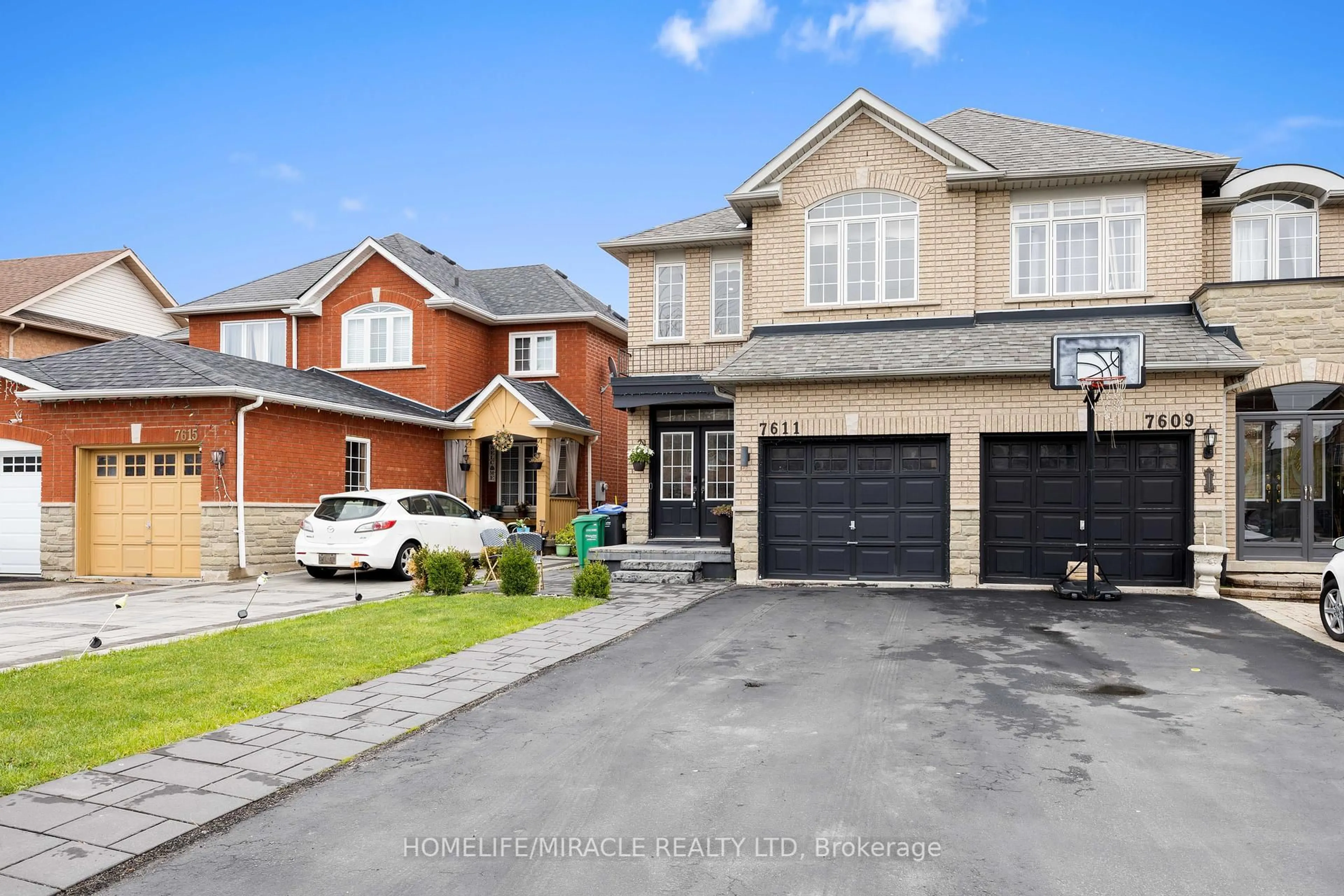 Home with brick exterior material, street for 7611 Black Walnut Tr, Mississauga Ontario L5N 8A7