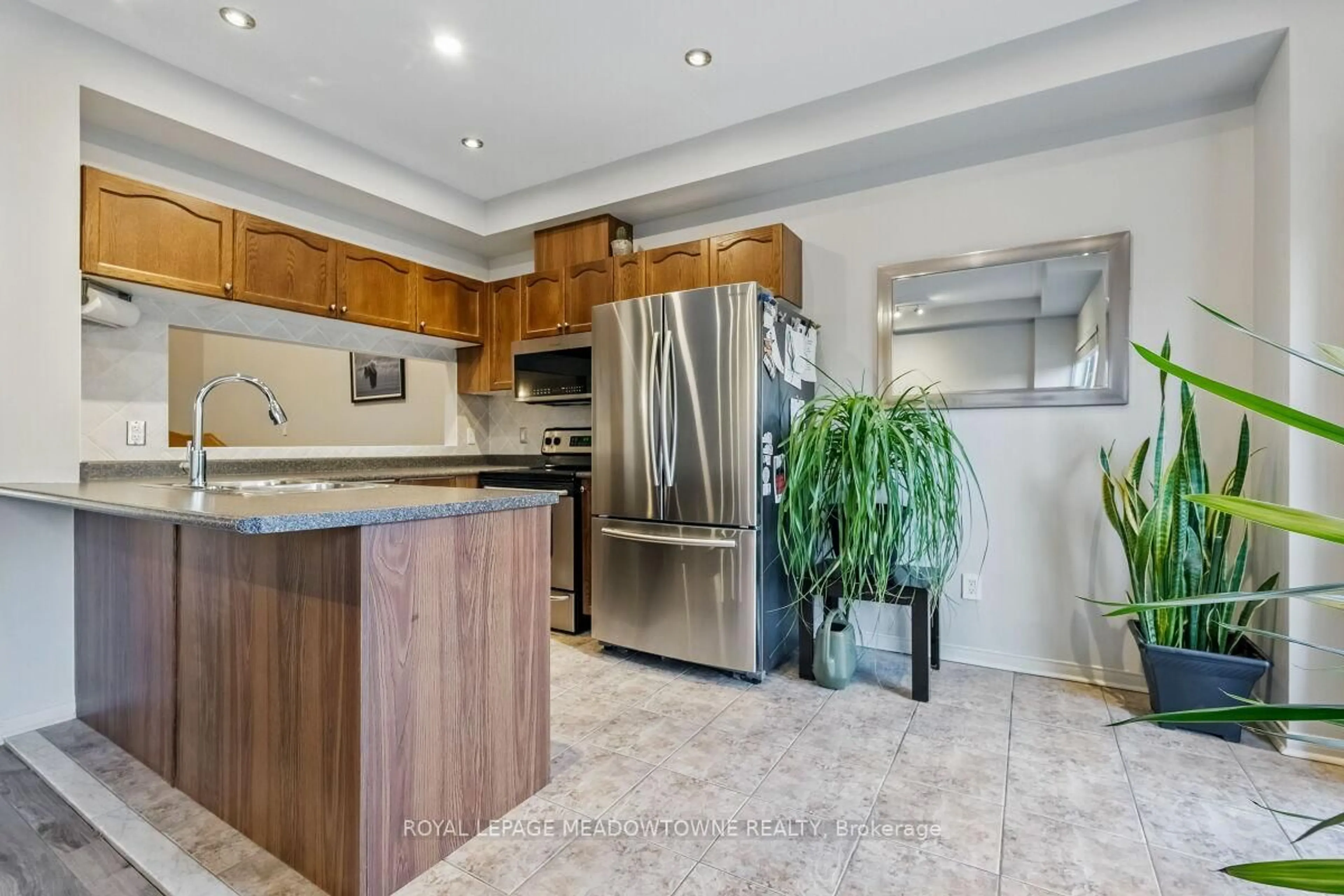 Open concept kitchen, ceramic/tile floor for 1268 Cartmer Way, Milton Ontario L9T 6J8