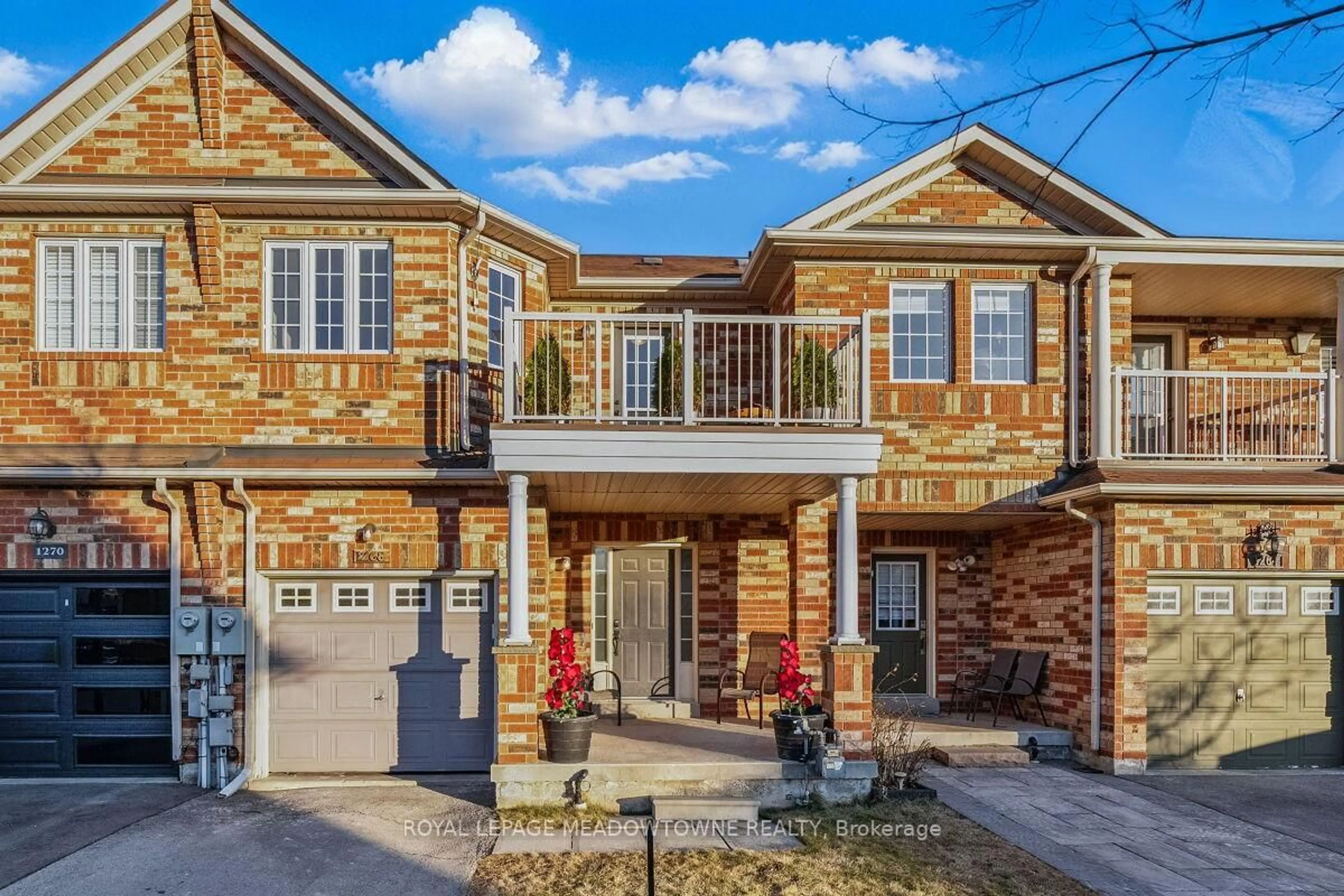Home with brick exterior material, street for 1268 Cartmer Way, Milton Ontario L9T 6J8