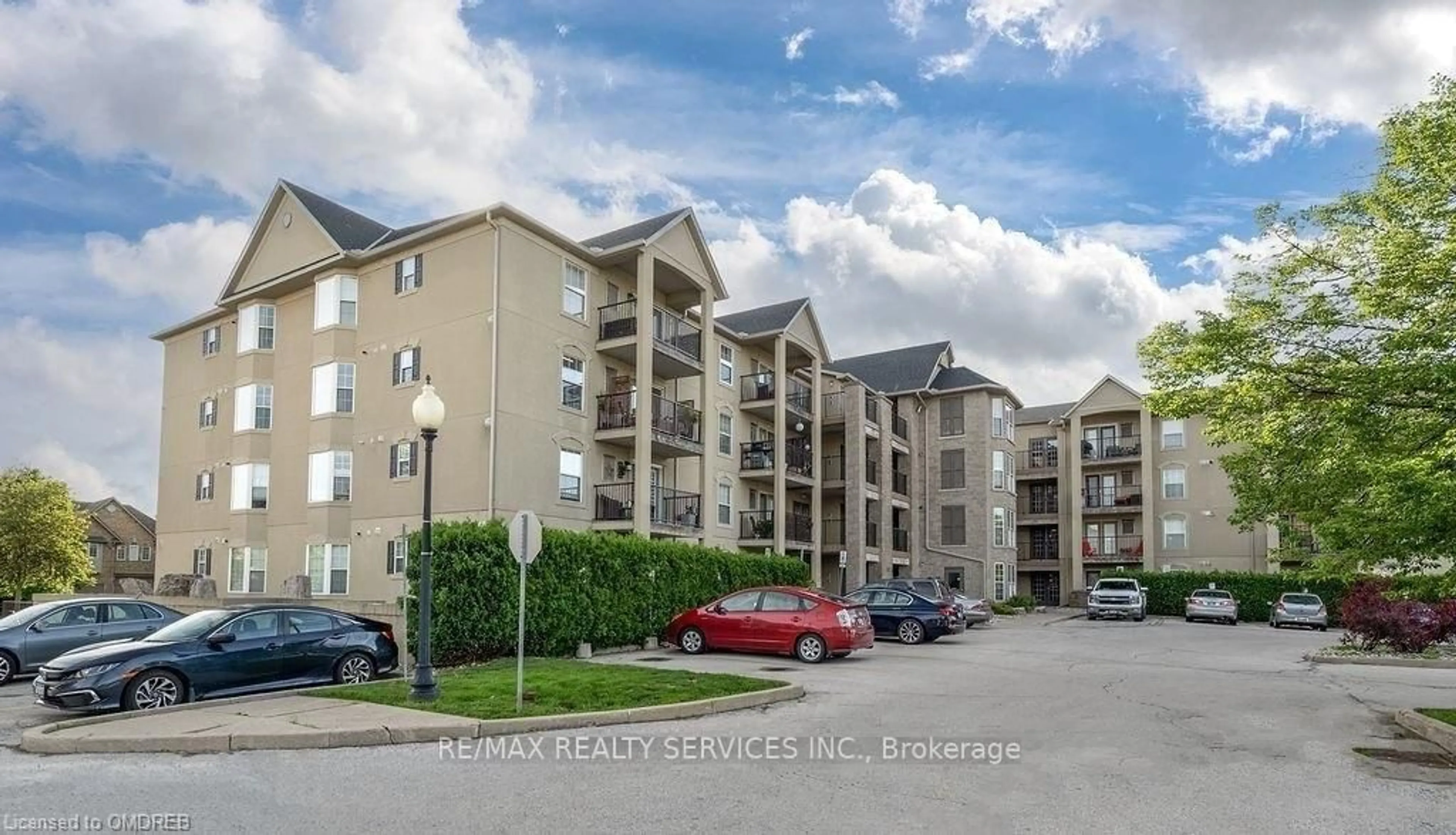A pic from outside/outdoor area/front of a property/back of a property/a pic from drone, unknown for 1421 Walker's Line #302, Burlington Ontario L7M 4P4