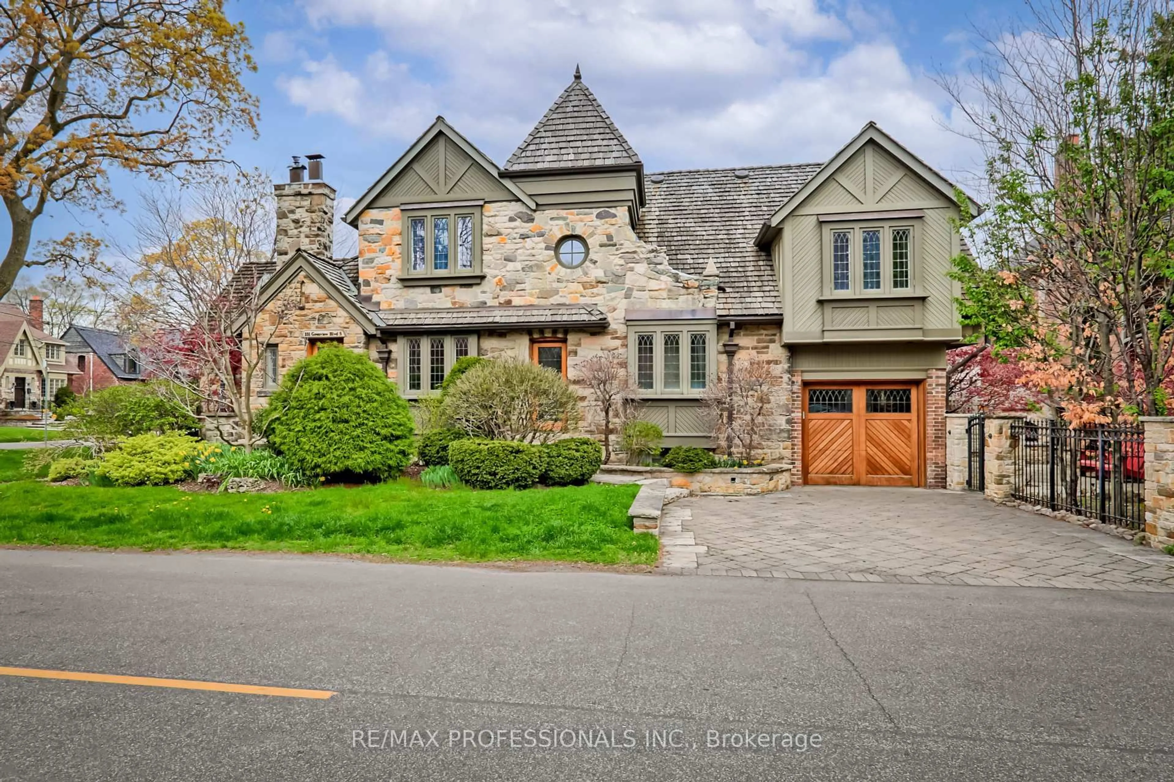 Home with brick exterior material, street for 231 Grenview Blvd, Toronto Ontario M8Y 3V2