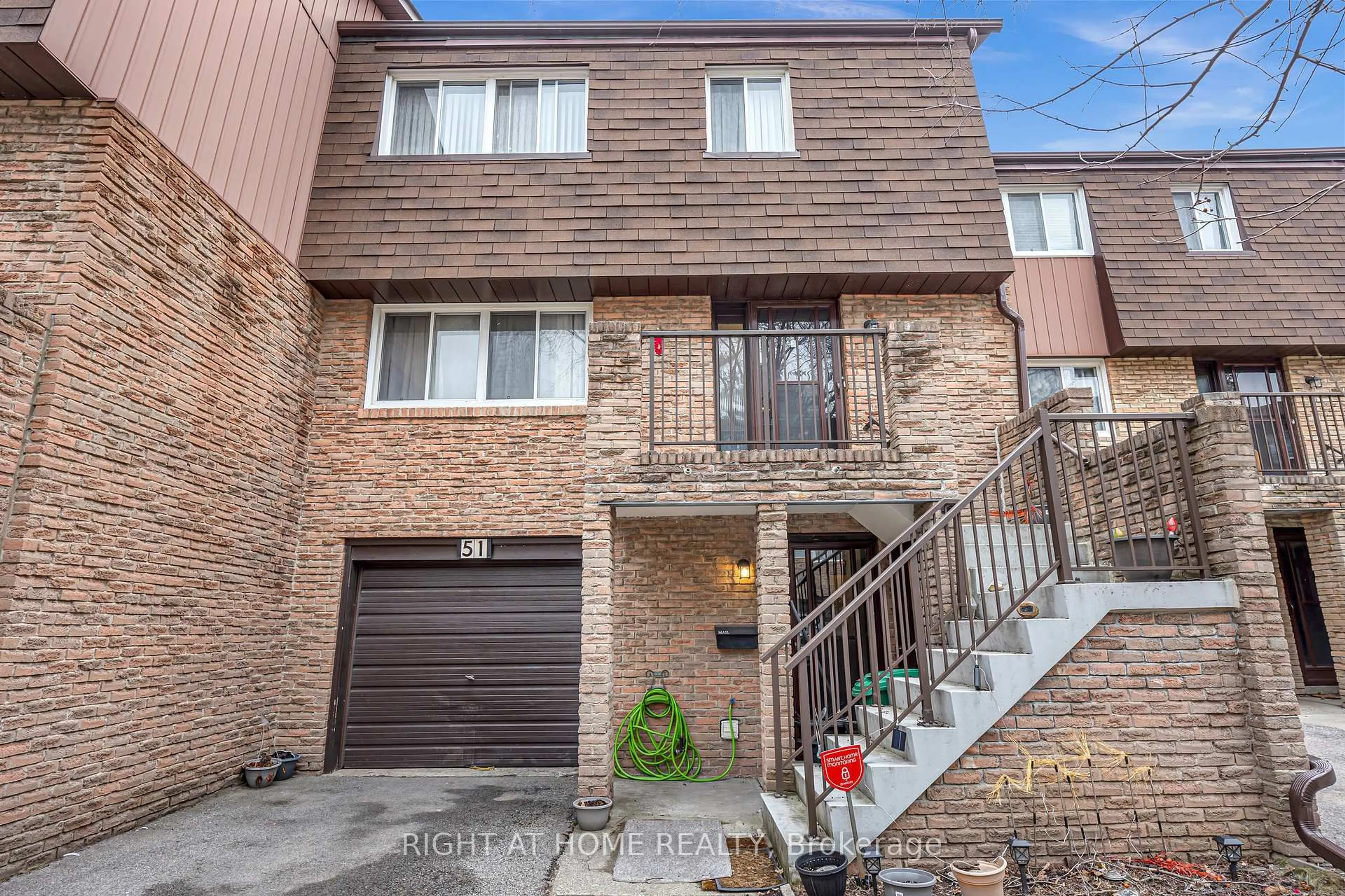 Home with brick exterior material, street for 7030 Copenhagen Rd #51, Mississauga Ontario L5N 2P3