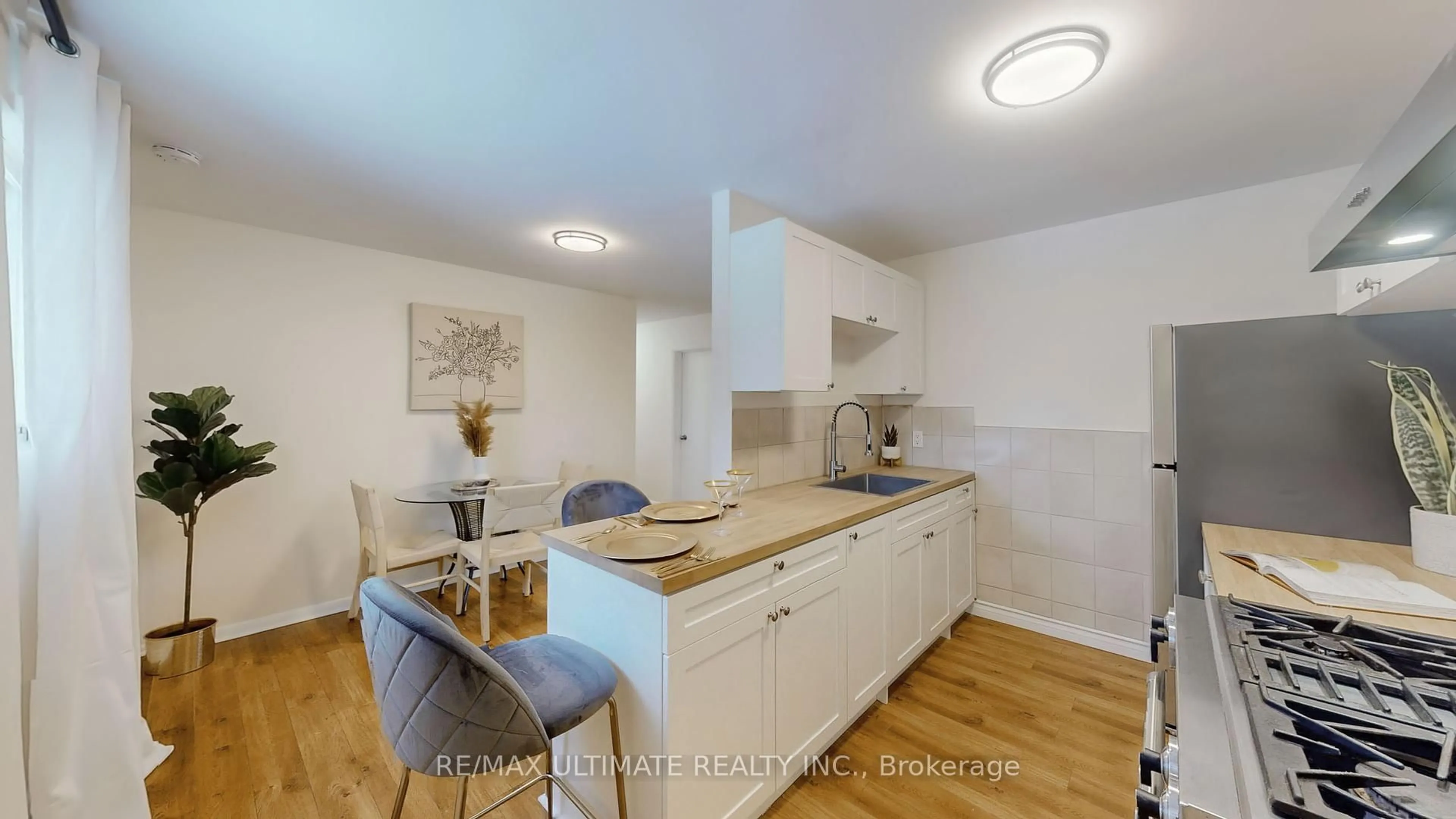 Open concept kitchen, wood/laminate floor for 24 Rexway Dr, Halton Hills Ontario L7G 1P8