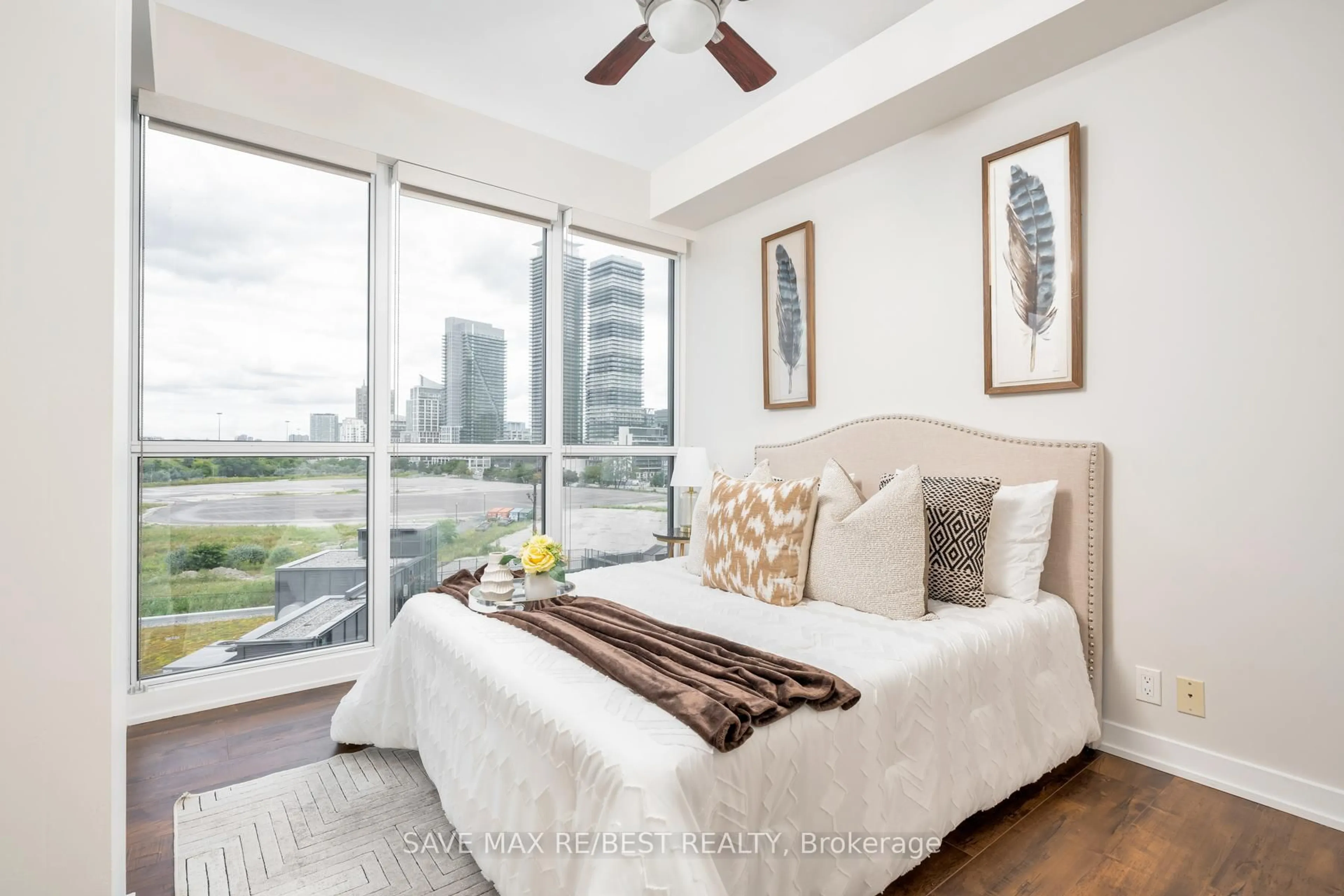Bedroom with bed, wood/laminate floor for 10 Park Lawn Rd #807, Toronto Ontario M8V 0H9