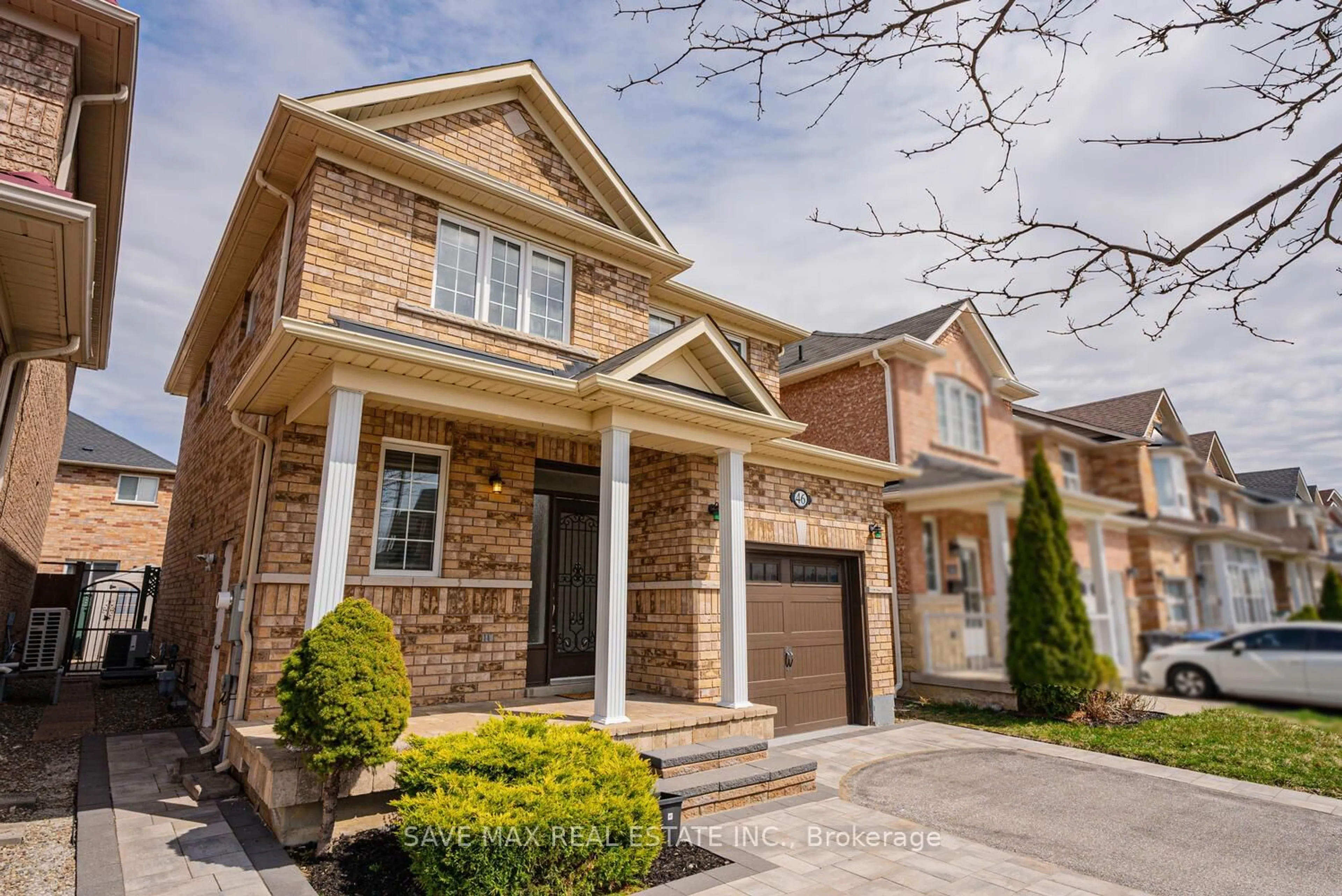 Home with brick exterior material, street for 46 Lockburn Cres, Brampton Ontario L7A 3W7