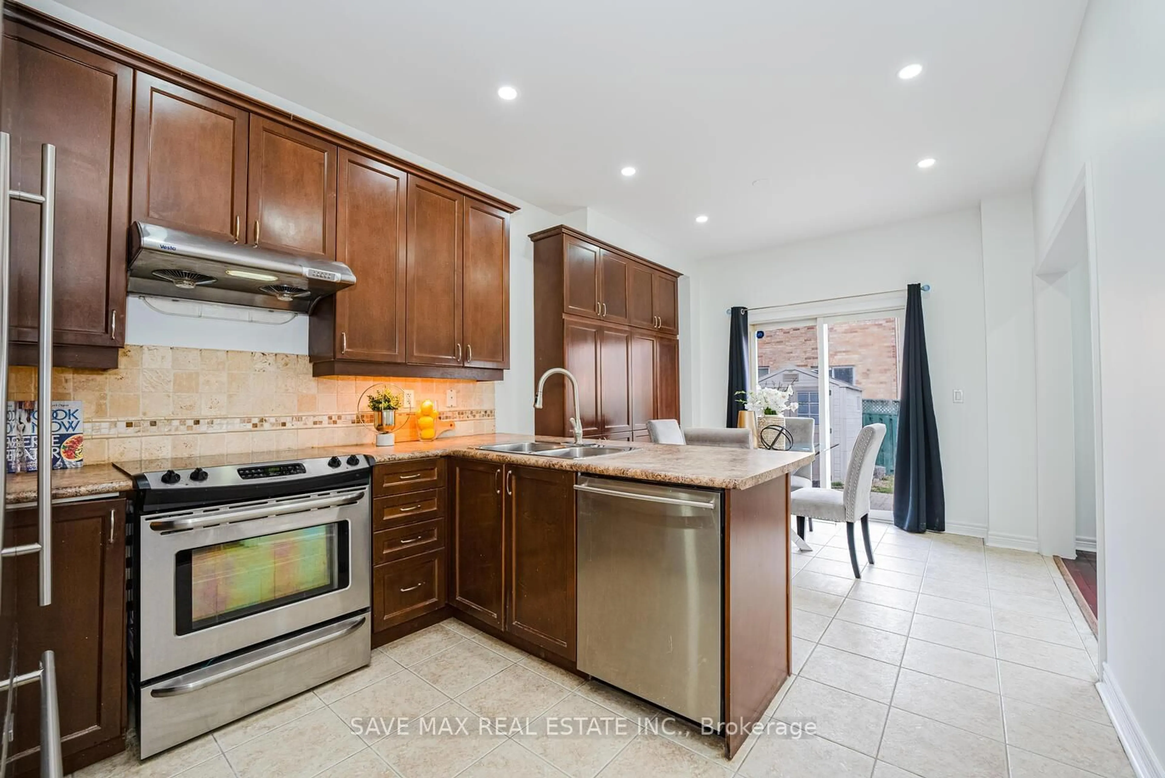Open concept kitchen, ceramic/tile floor for 46 Lockburn Cres, Brampton Ontario L7A 3W7