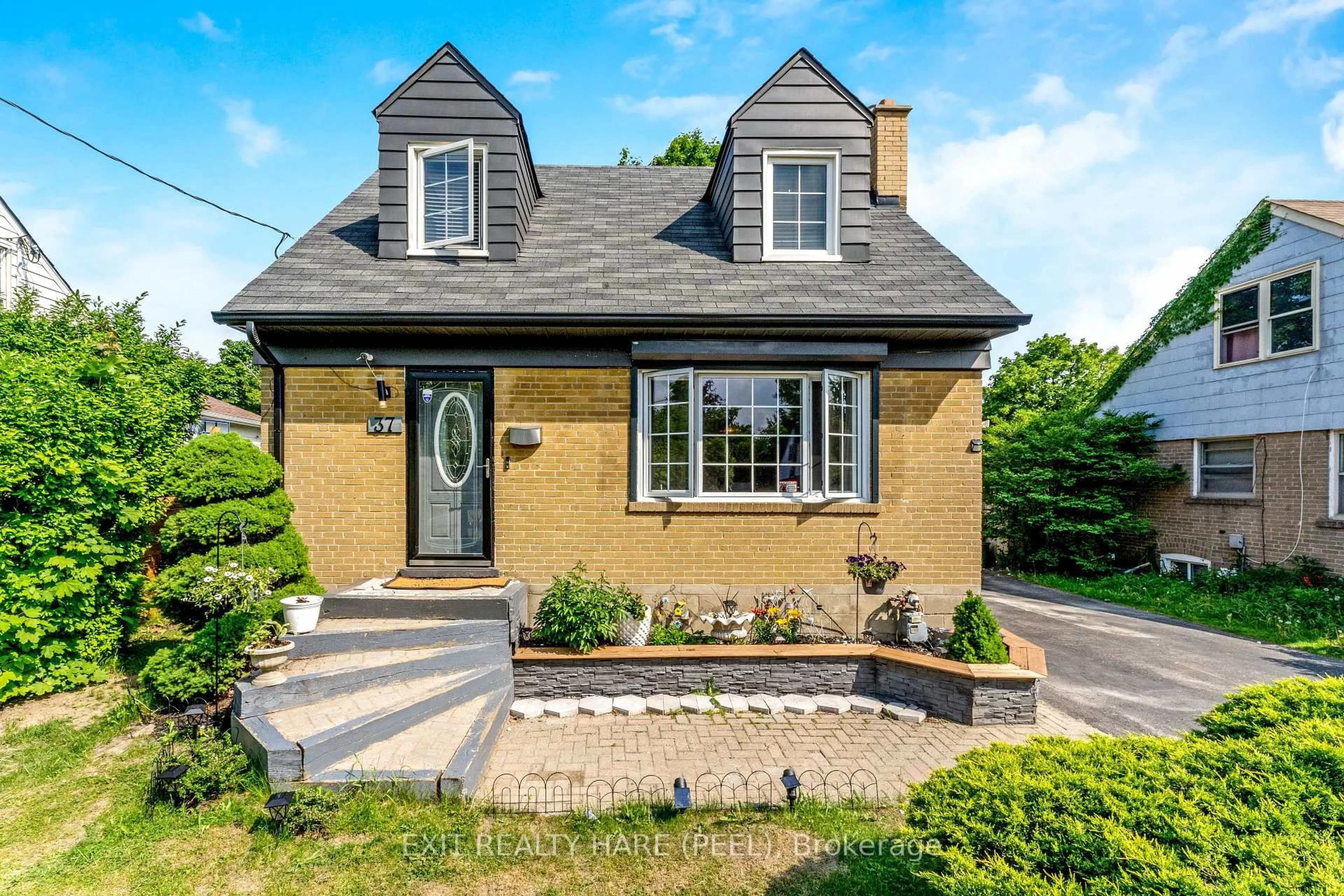Home with brick exterior material, street for 37 Mccaul St, Brampton Ontario L6V 1J1