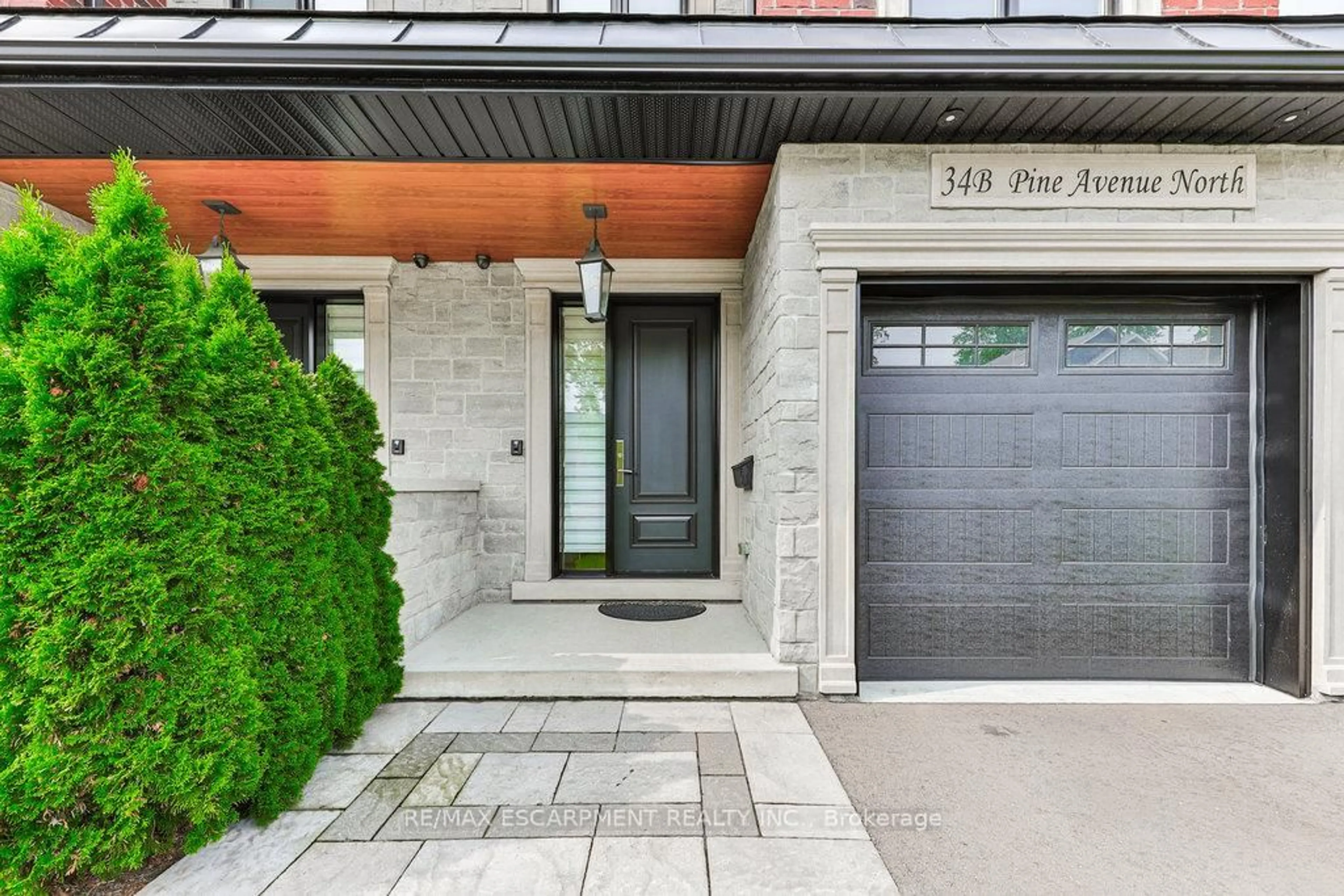 Home with brick exterior material, street for 34B Pine Ave, Mississauga Ontario L5H 2P8