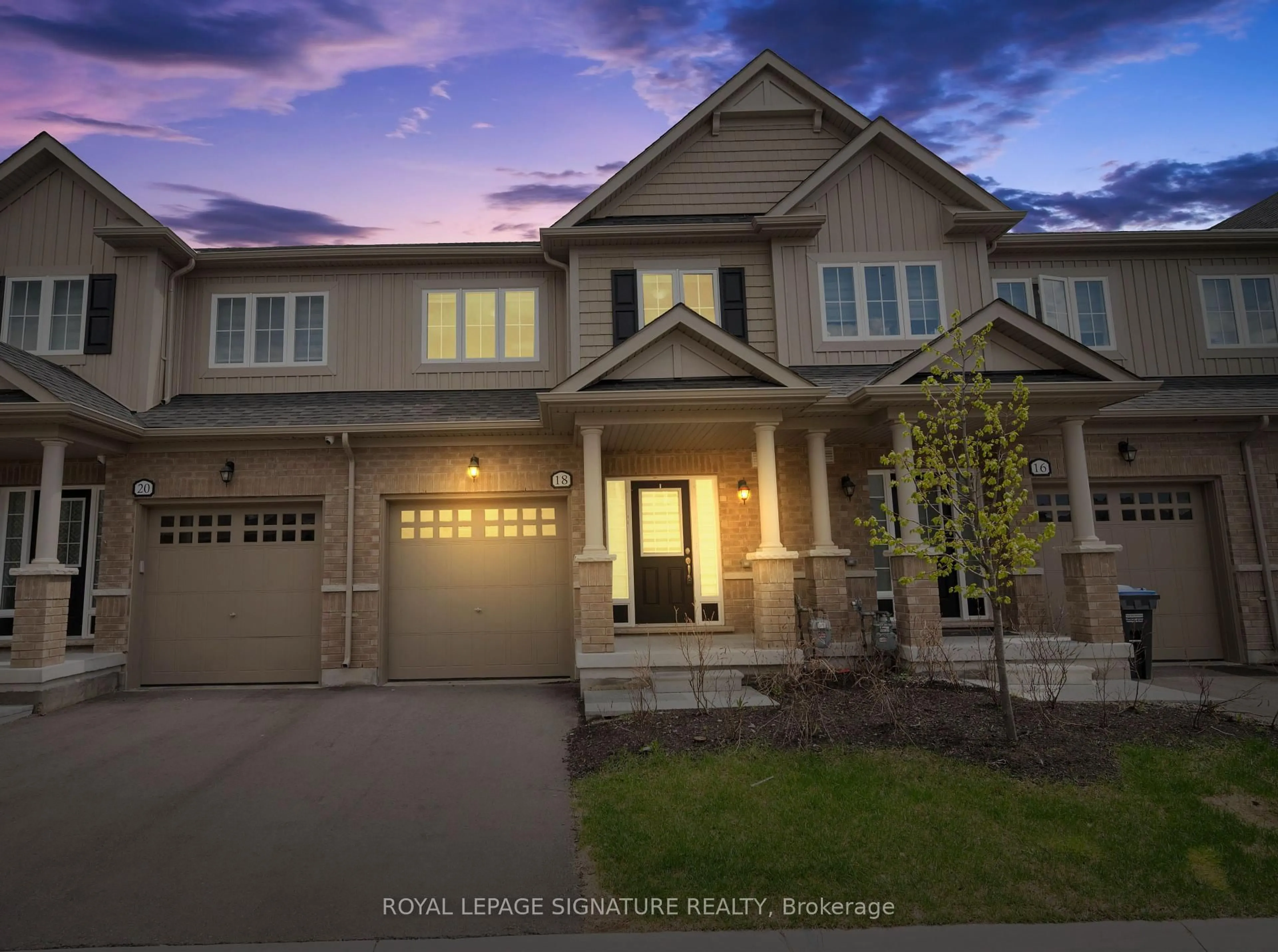 Home with vinyl exterior material, street for 18 Brixham Lane, Brampton Ontario L7A 0B3
